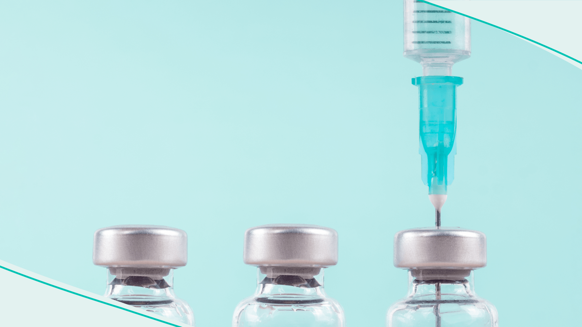Row of medical vials and syringe. Glass bottles with a transparent potion on a light background