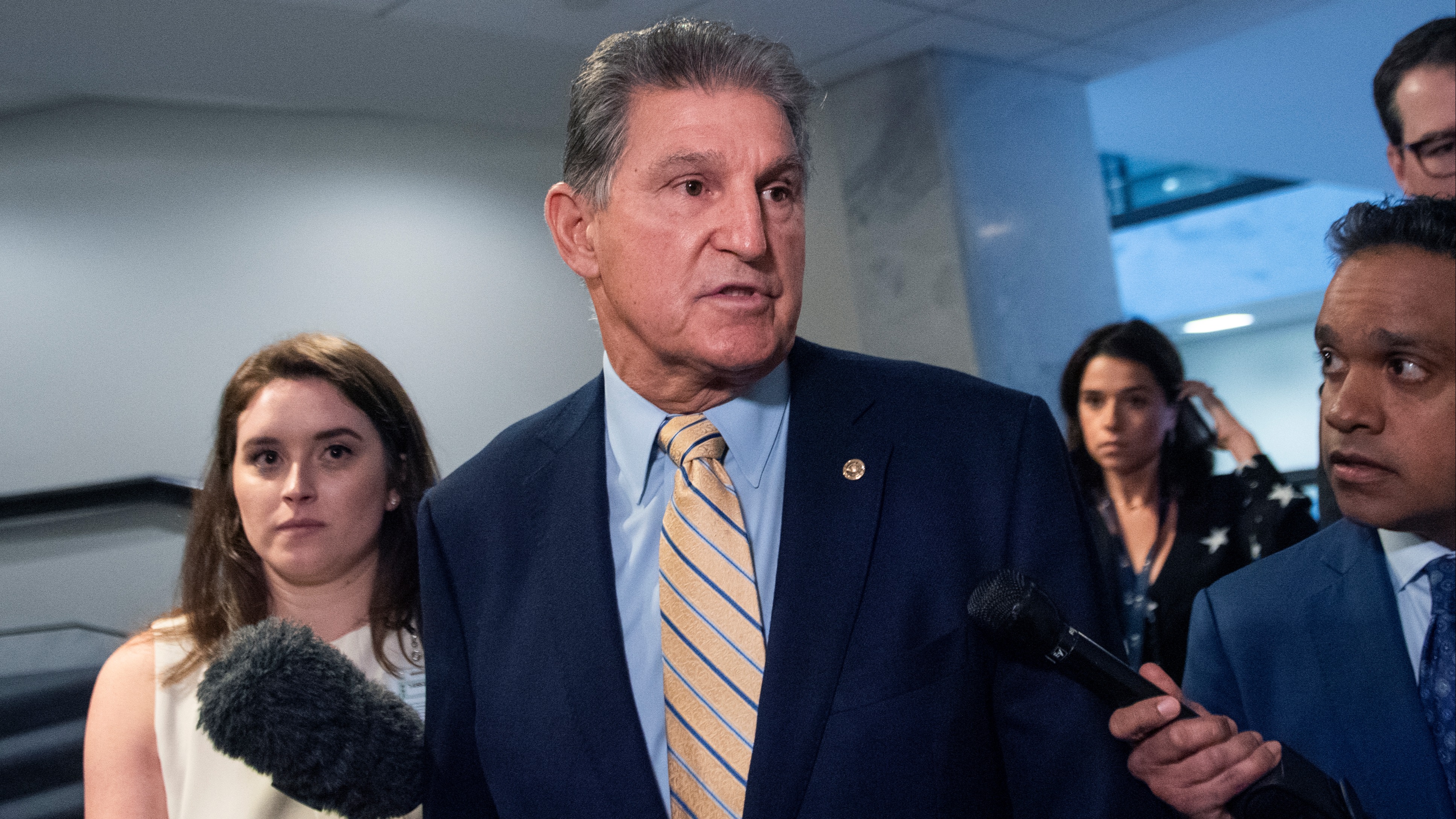 Sen. Joe Manchin, D-W.Va., leaves a bipartisan meeting in Hart Building
