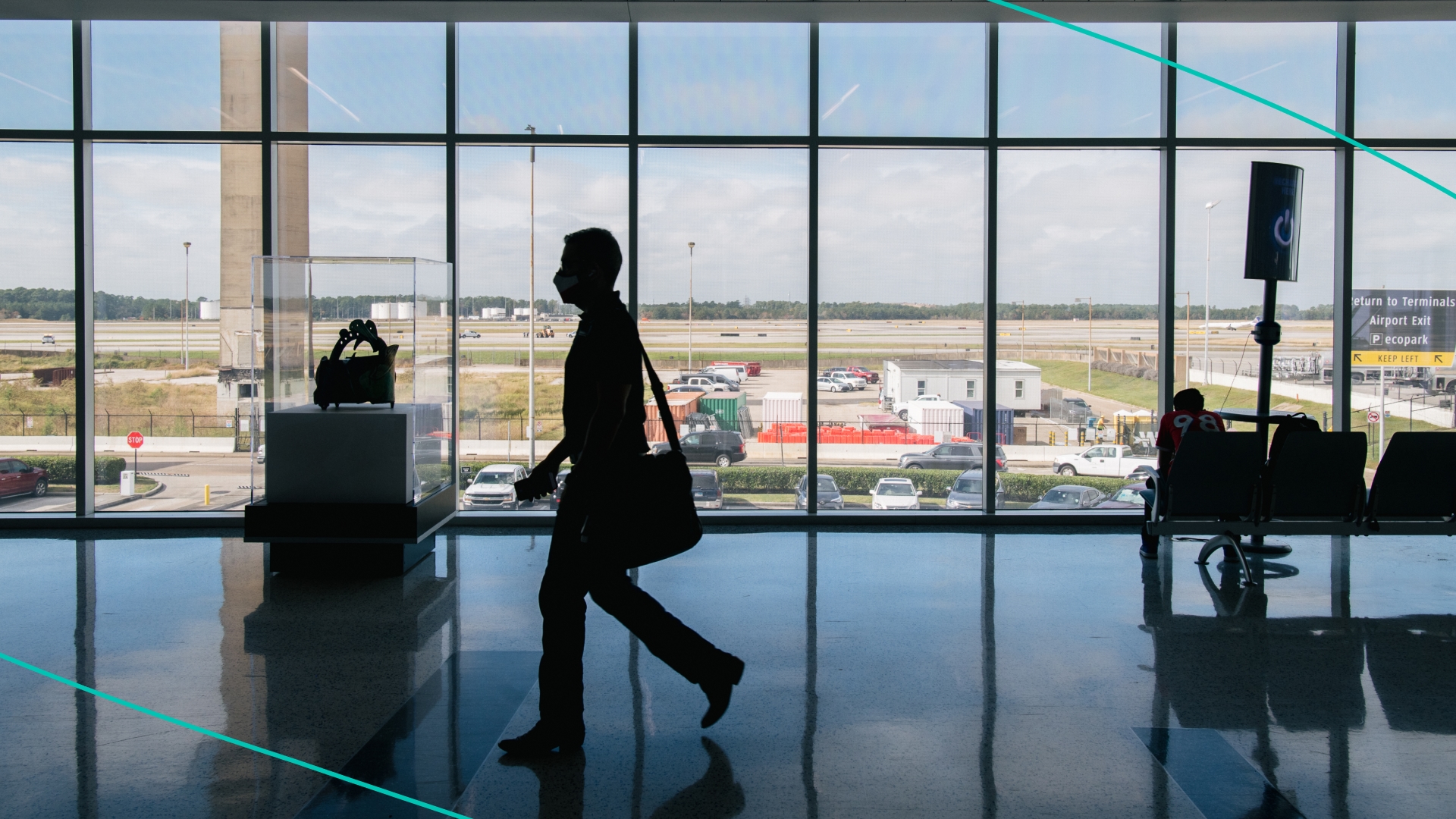 A traveller walks through the George Bush Intercontinental Airport on December 03, 2021 in Houston, Texas.
