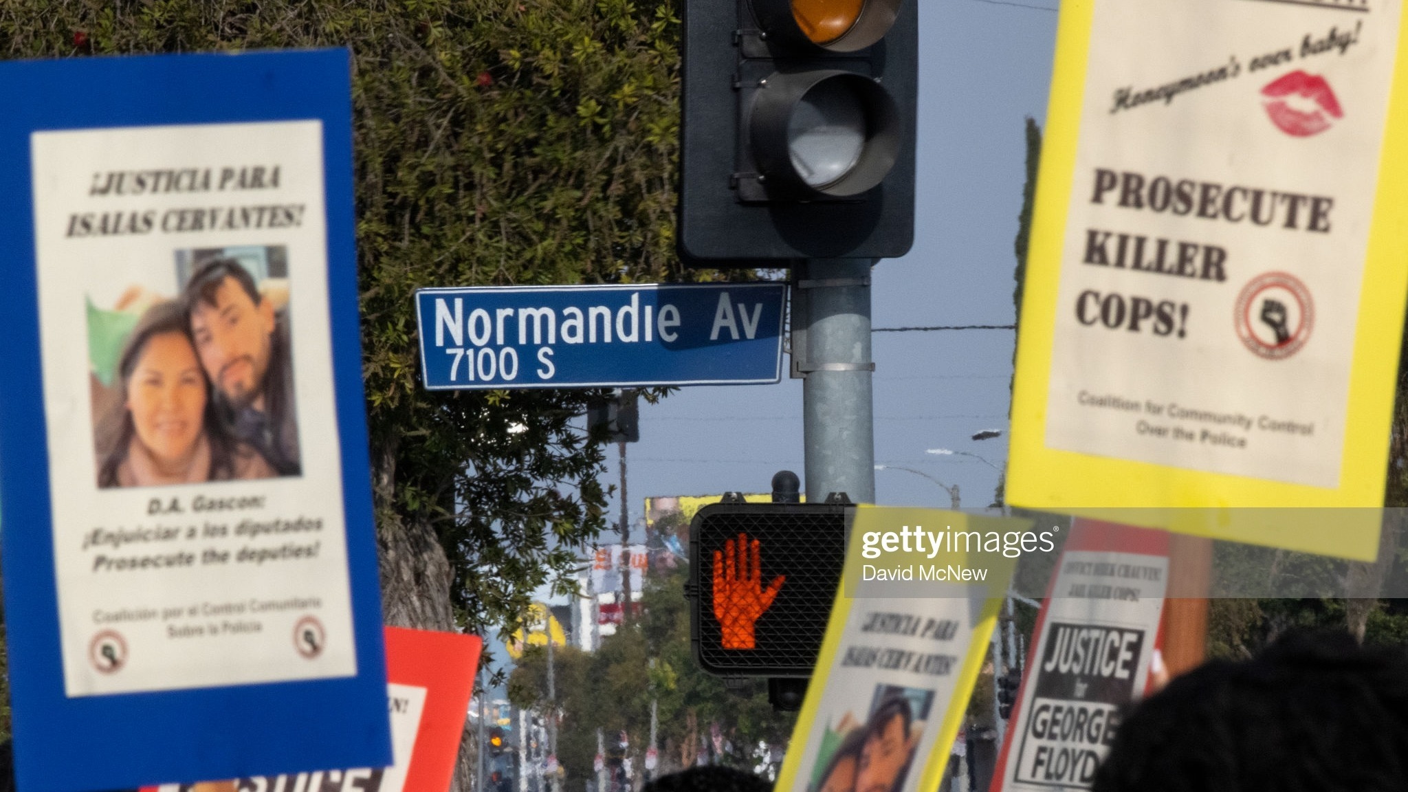 People gather at the historic intersection of Florence and Normandie to protest the fatal police shooting of Daunte Wright in Brooklyn Center, Minnesota, on April 12, 2021.