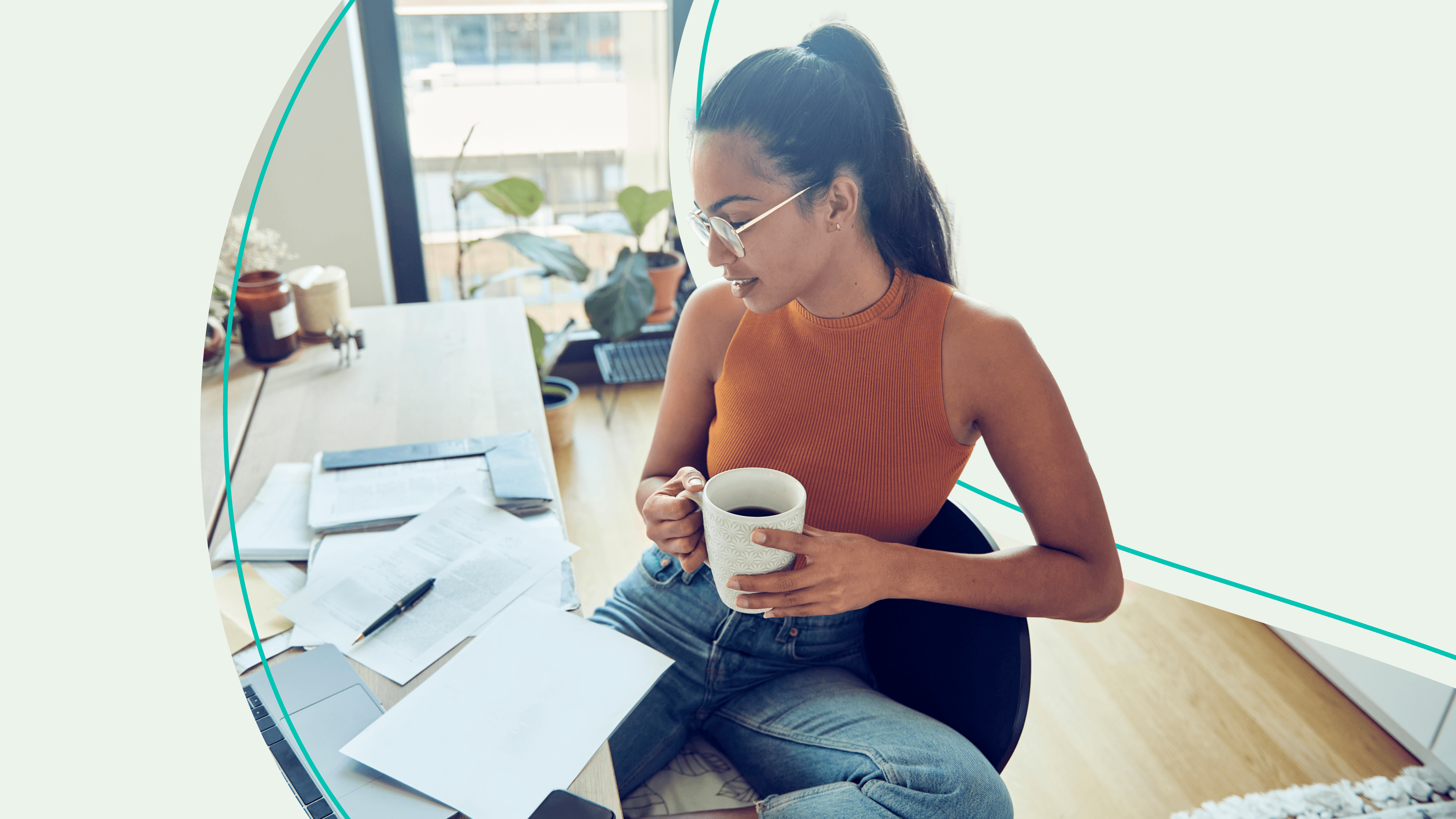 A woman sitting at a desk working on taxes