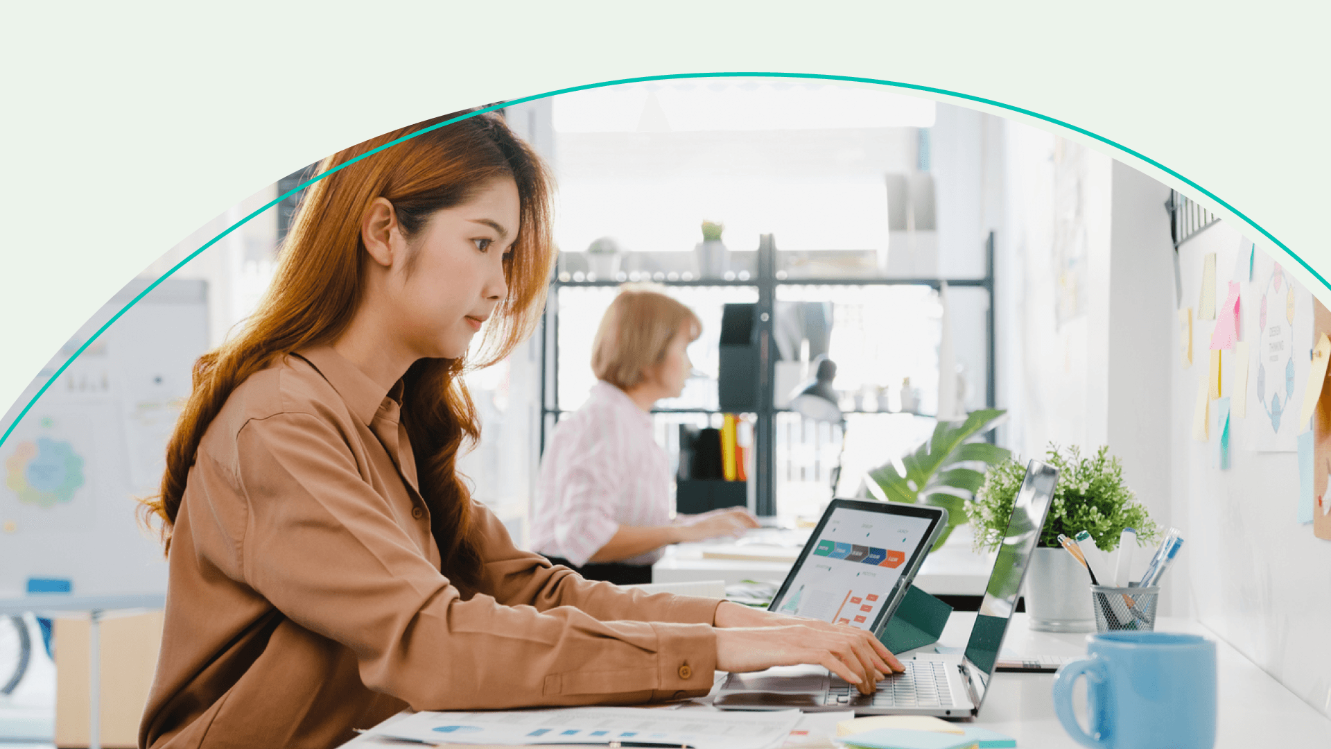 accessibility, woman using laptop in office