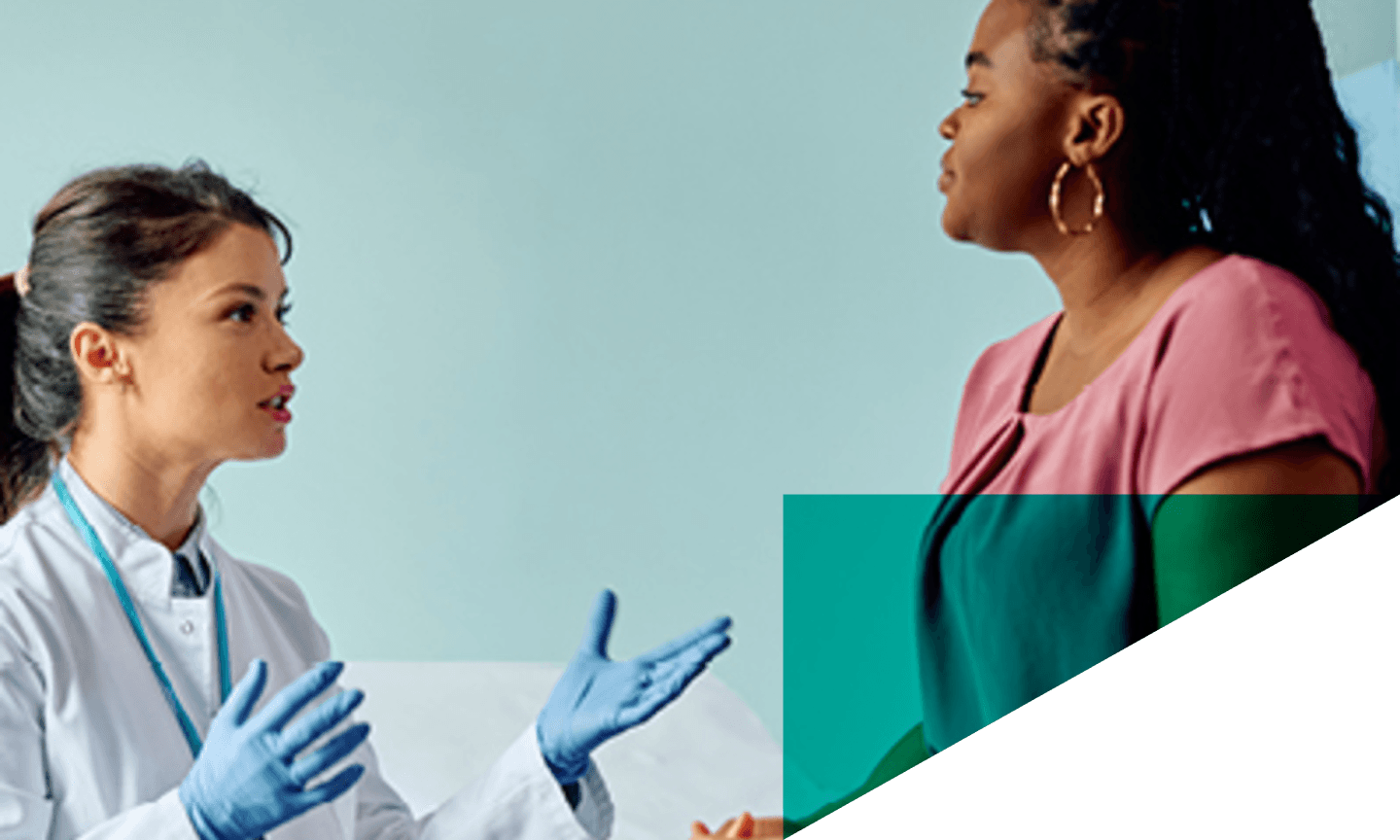 doctor speaking to woman