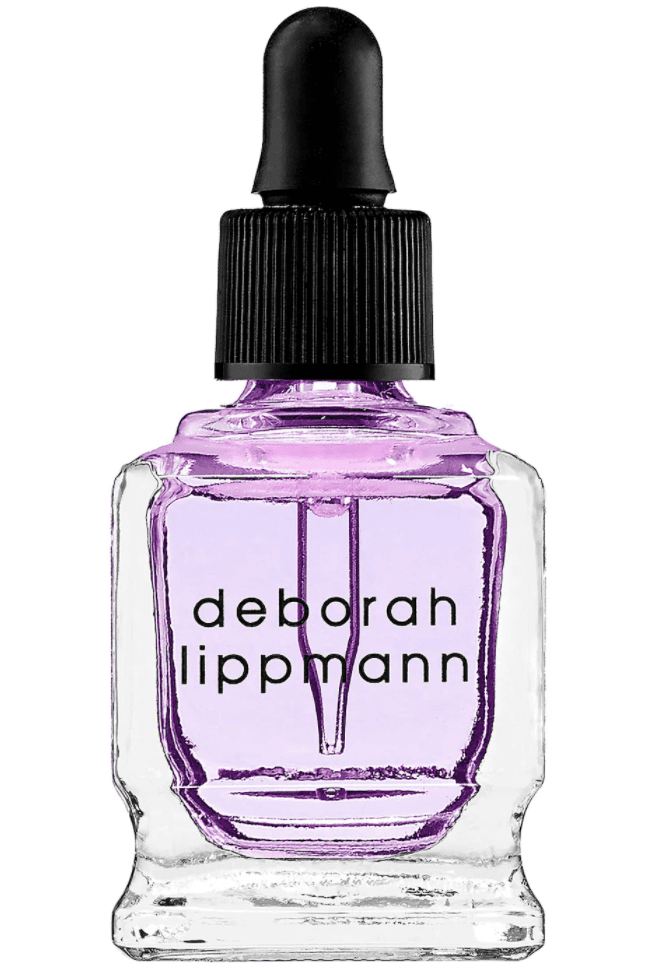 A bottle of purple Deborah Lippmann Cuticle Oil for fixing broken nails