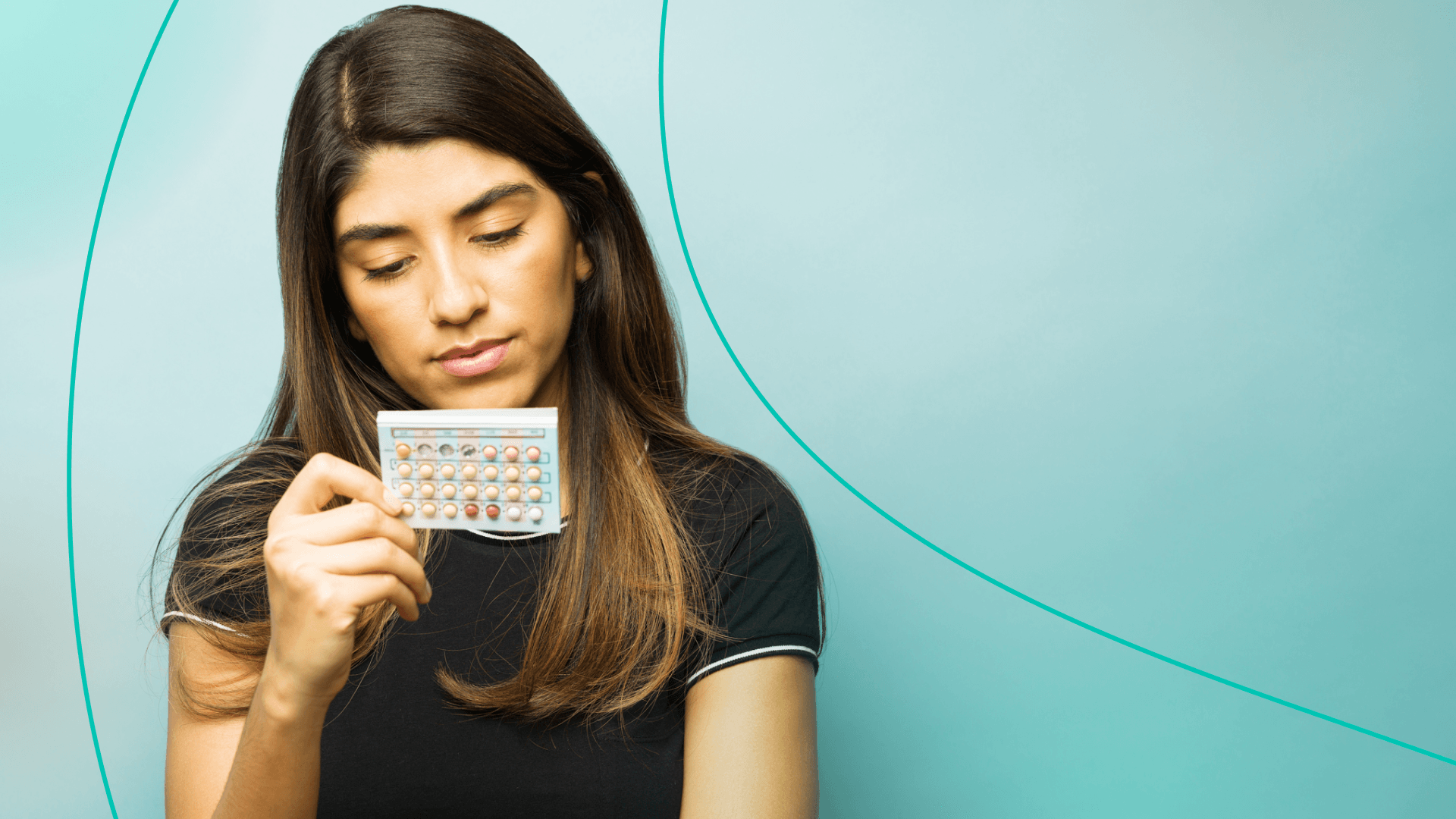 Woman examining bc pills