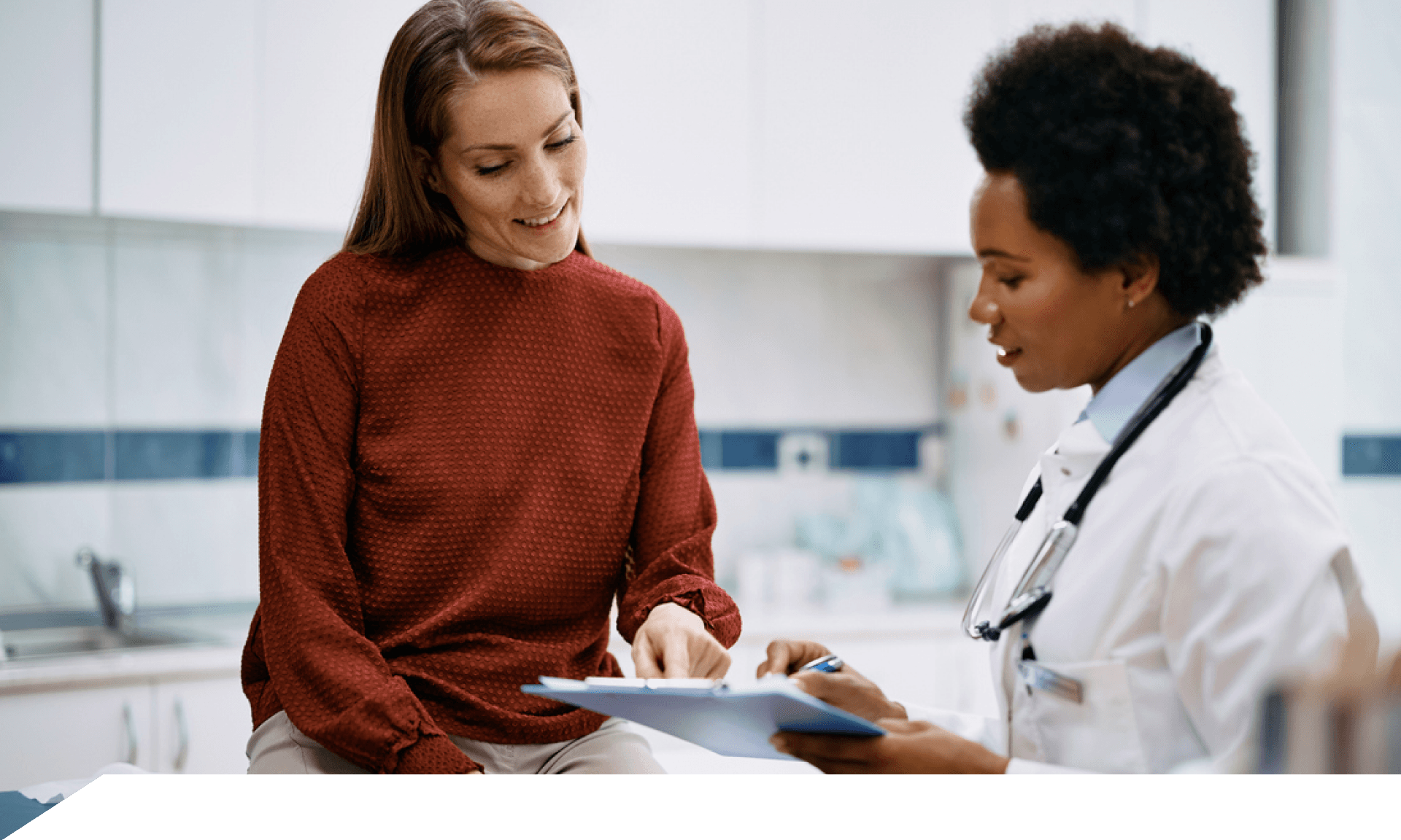 A woman talking with her doctor