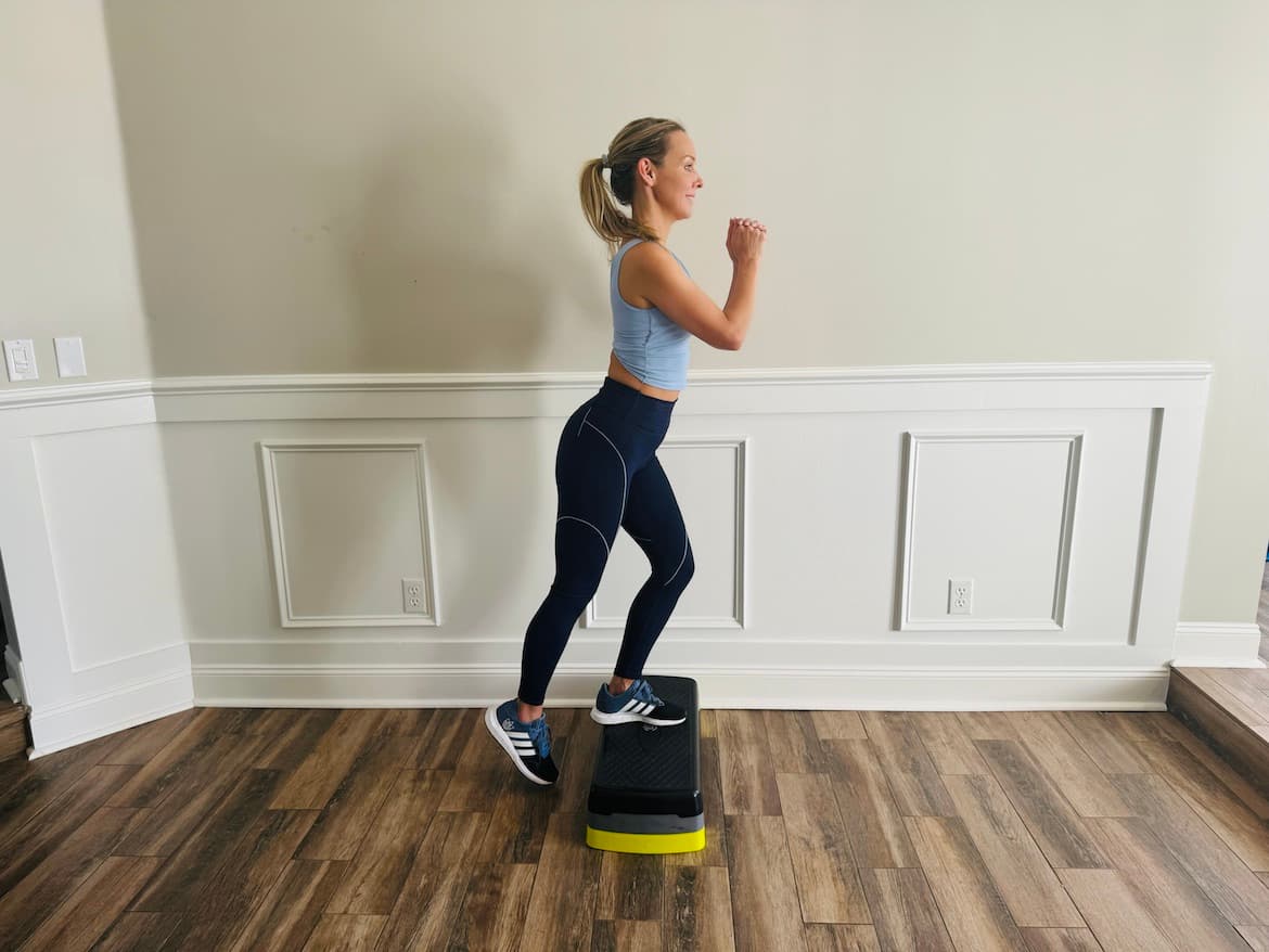 Physical therapist demonstrating single-leg step-up