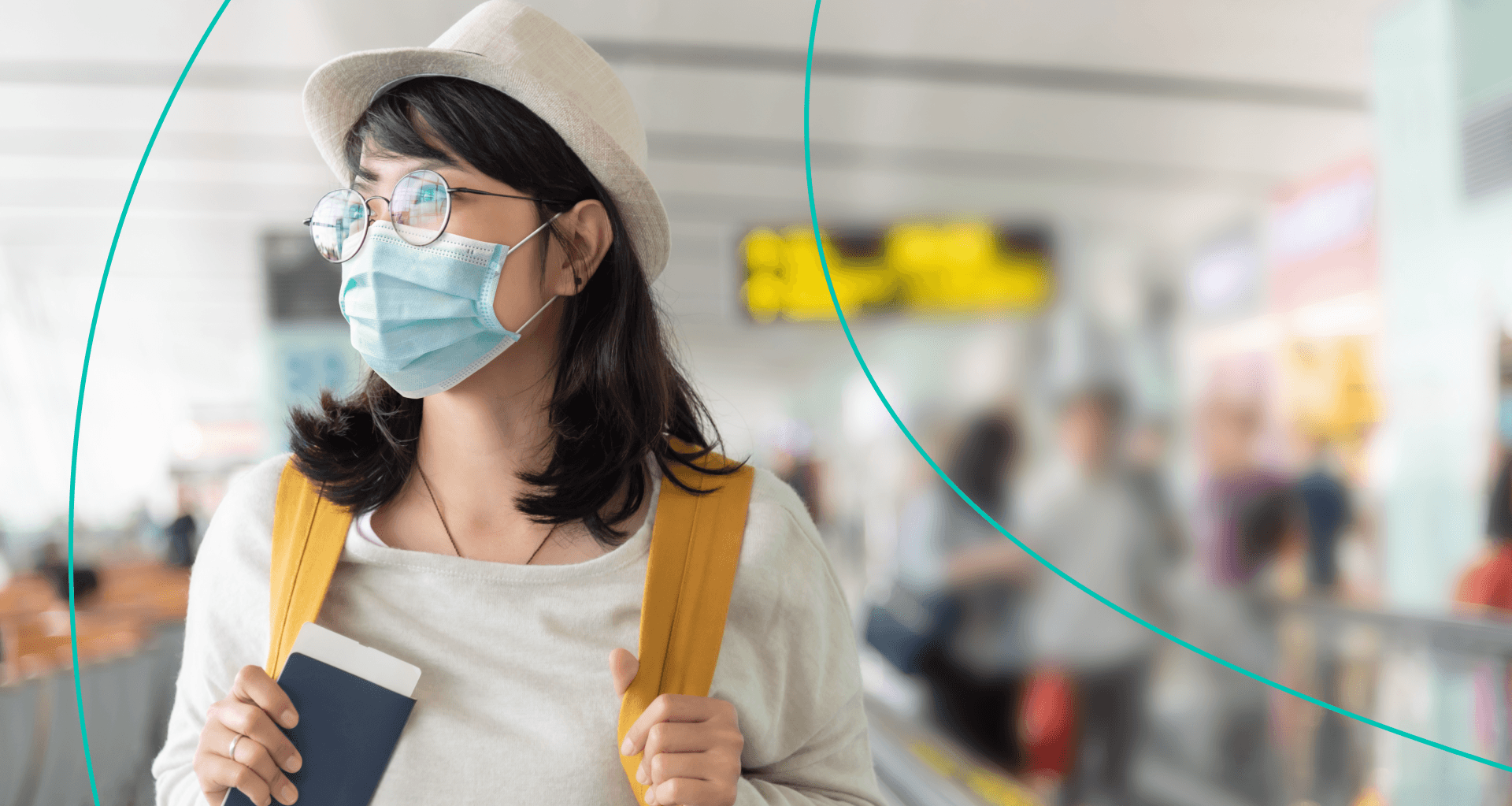 A woman at the airport holding a passport