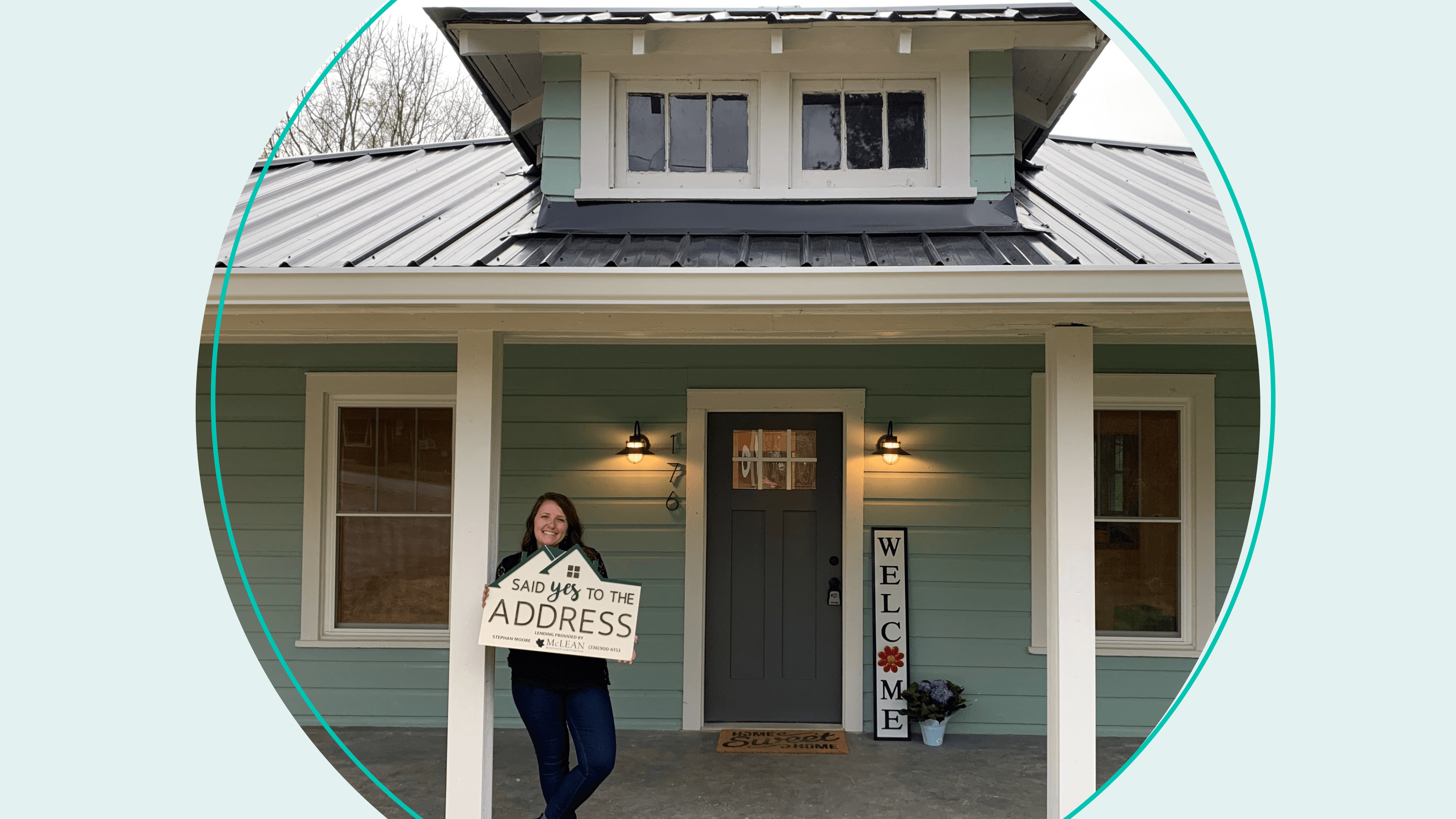 Image of Kelly M standing in front of house