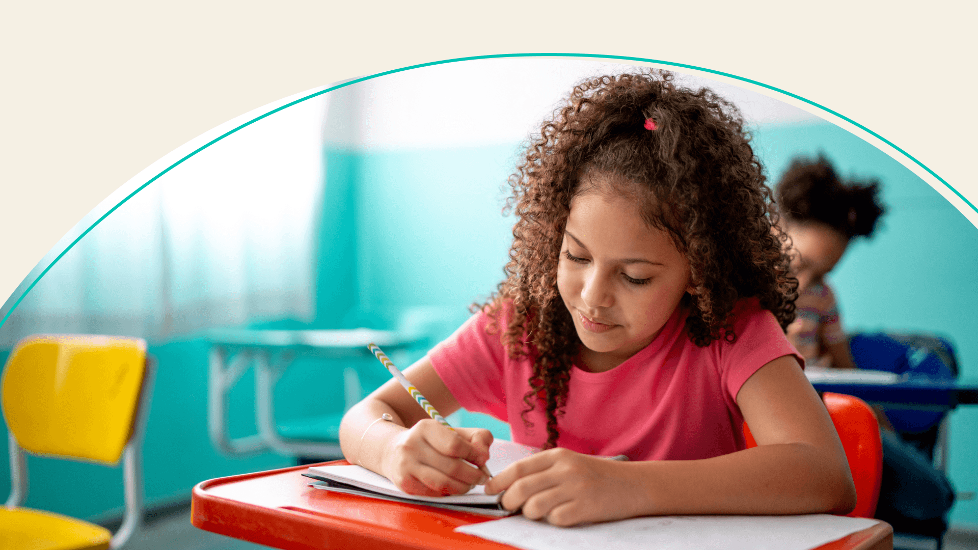 A student working on an assignment at her desk