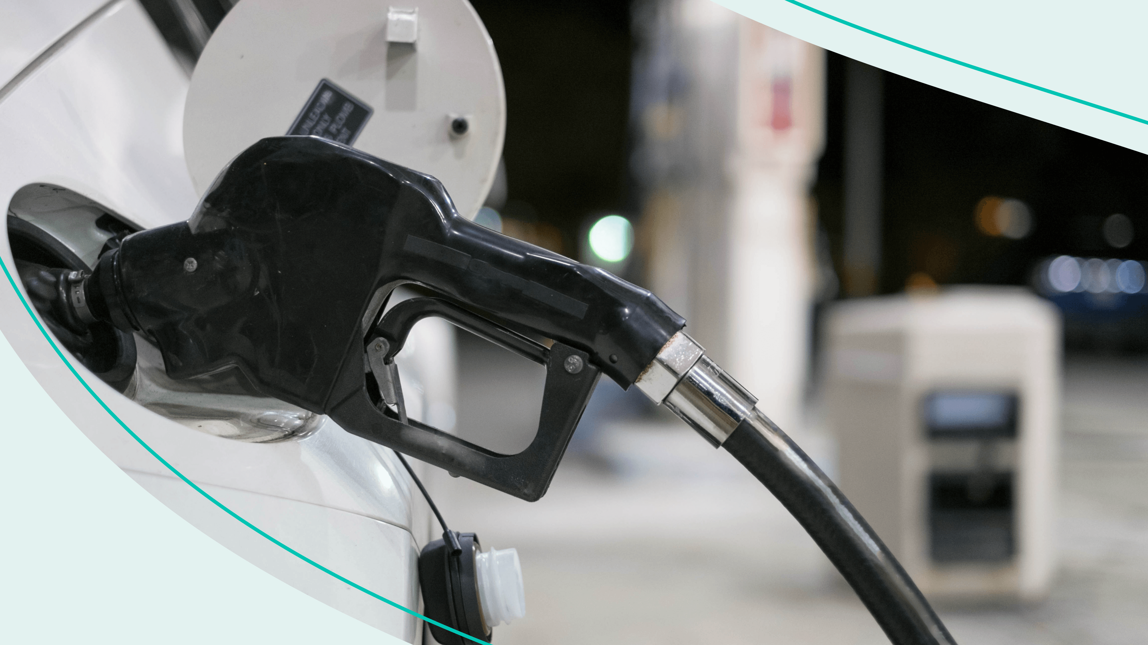 A car at a gas pump.