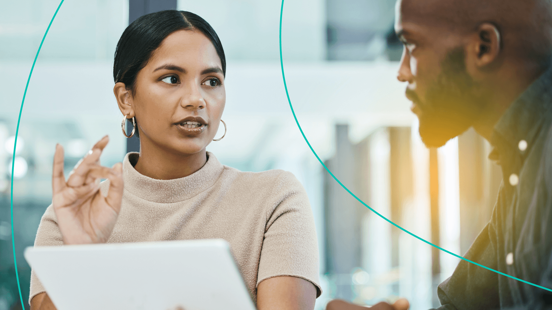 Woman and man talking about work.