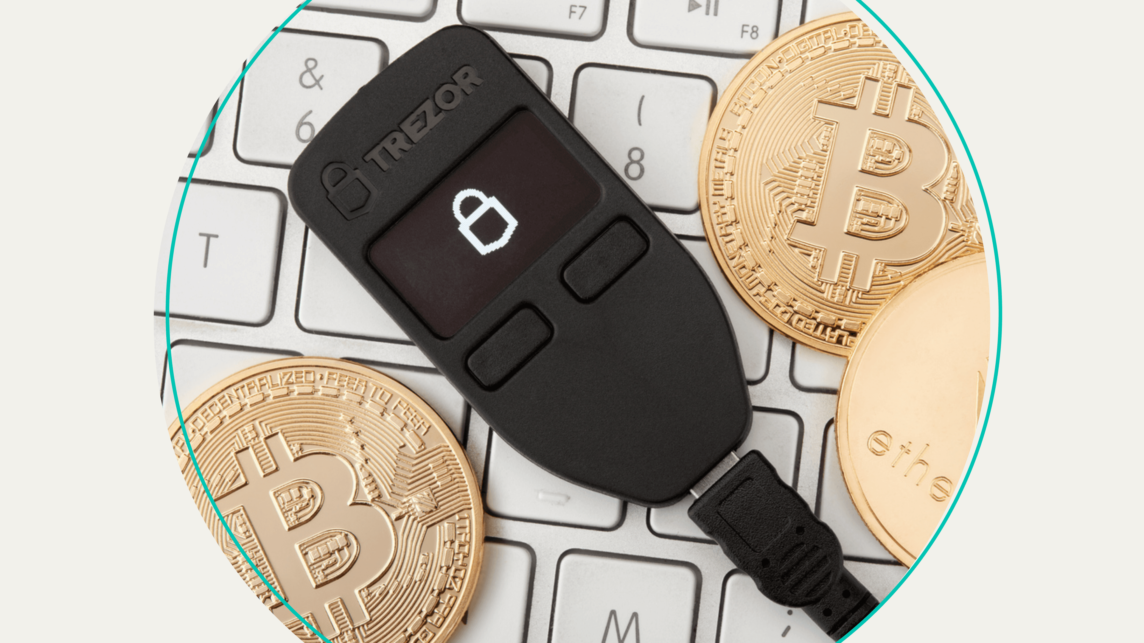A hardware wallet surrounded by bitcoins.
