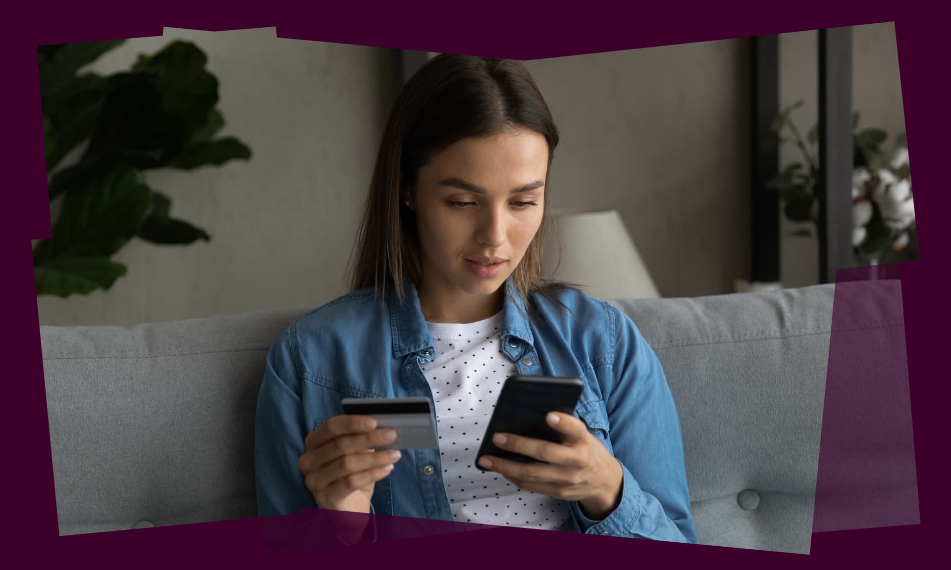 woman on phone with card in hand