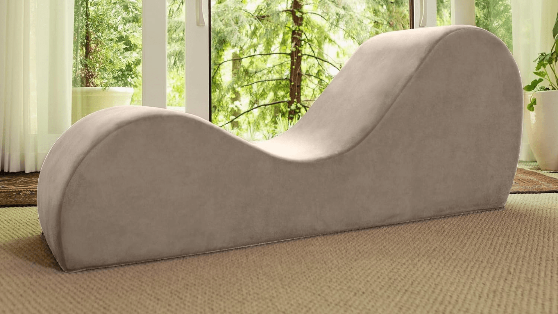 Beige taupe chaise in front of window