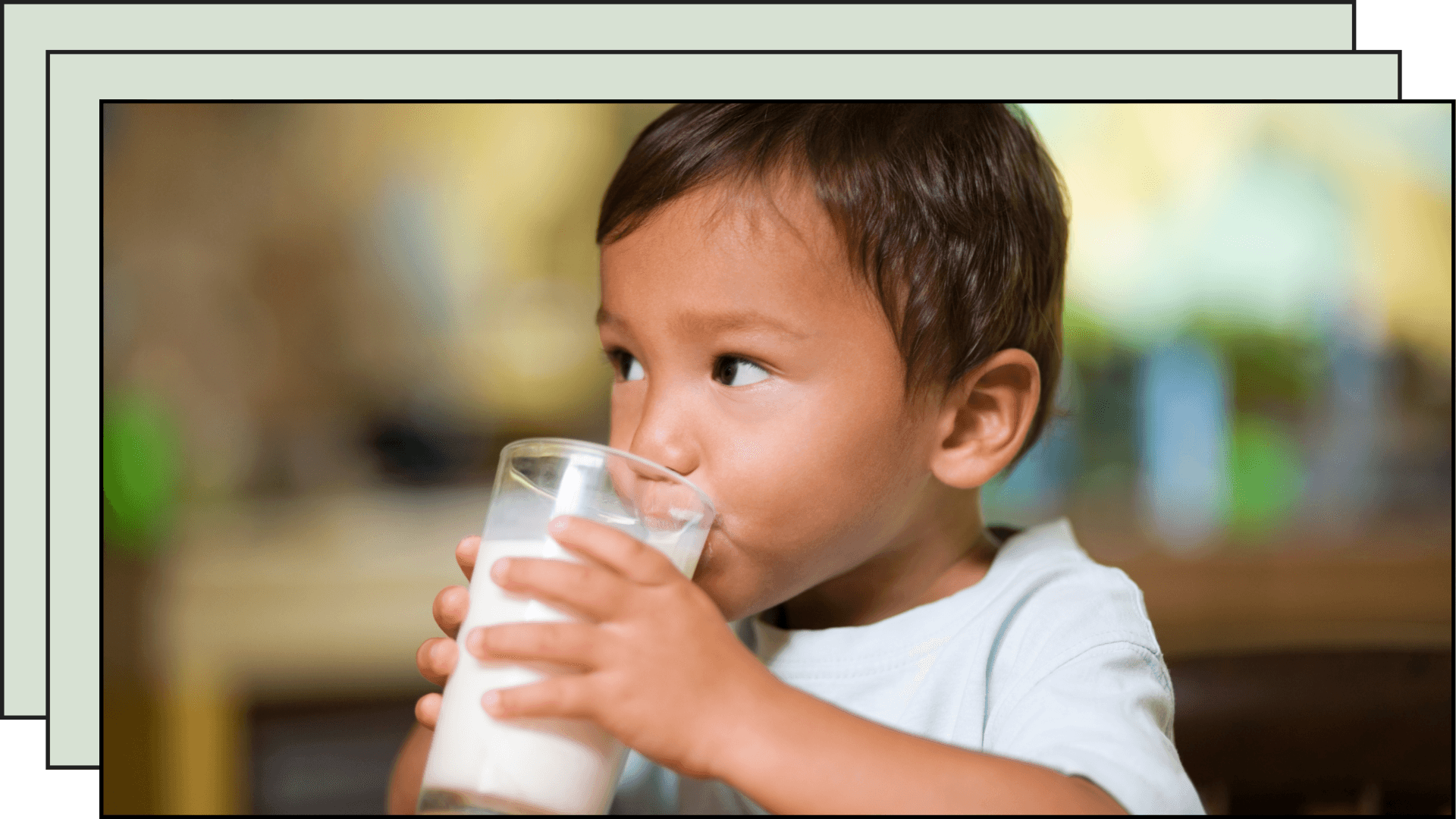 little kid drinking milk