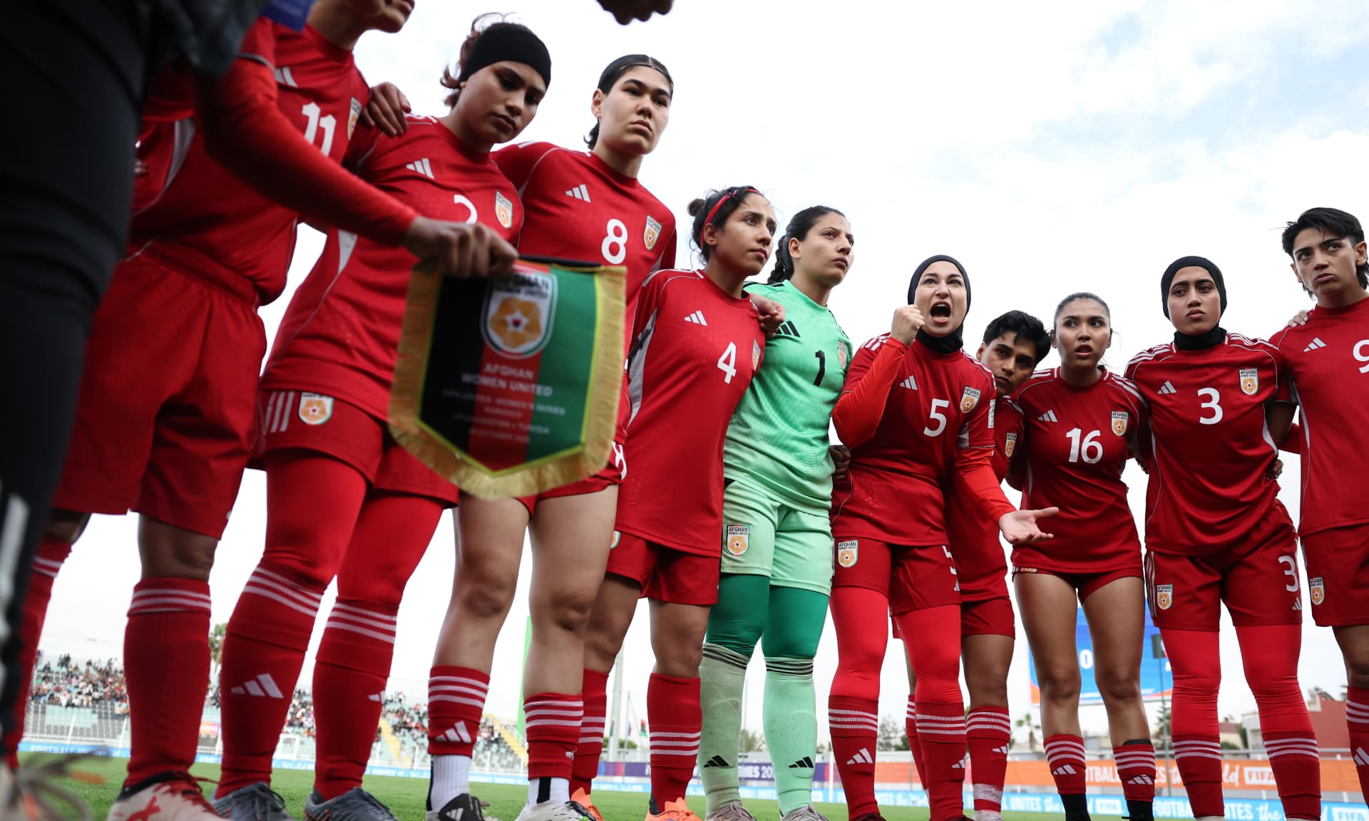 Fatima Sadat of Afghan Women's United reacts as she speaks with teammates as they huddle prior to the FIFA Unites: Women's Series 2025 match between Tunisia and Afghan Women United on October 29, 2025 in Casablanca, Morocco.