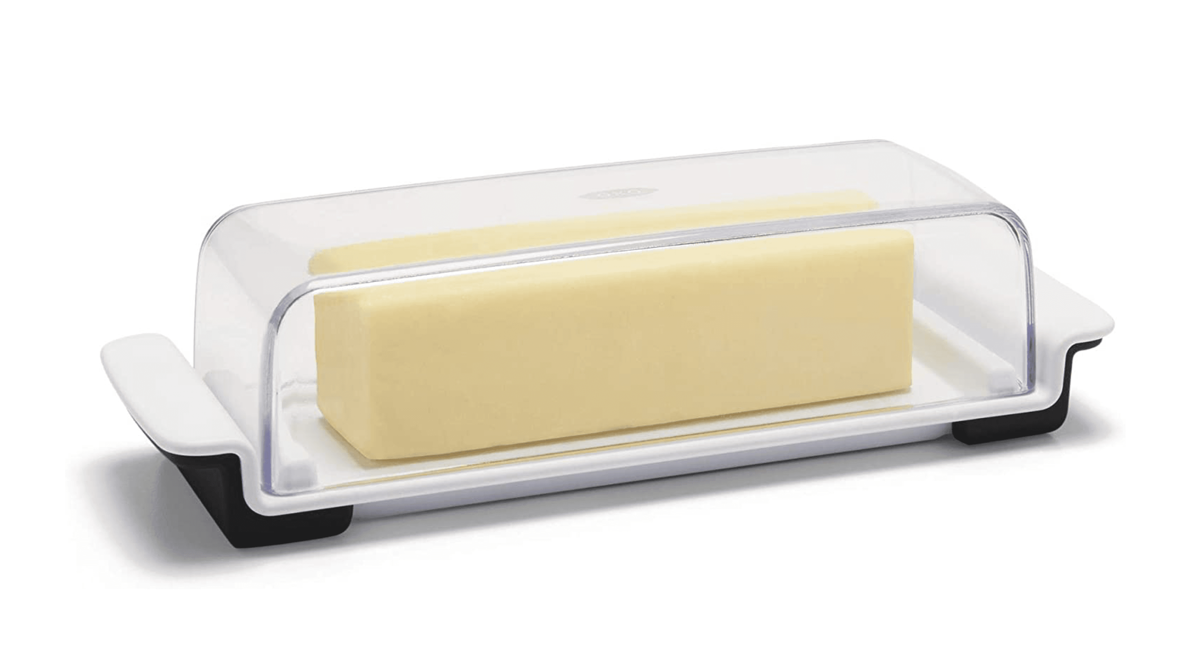 clear butter dish with rubber stoppers on the bottom