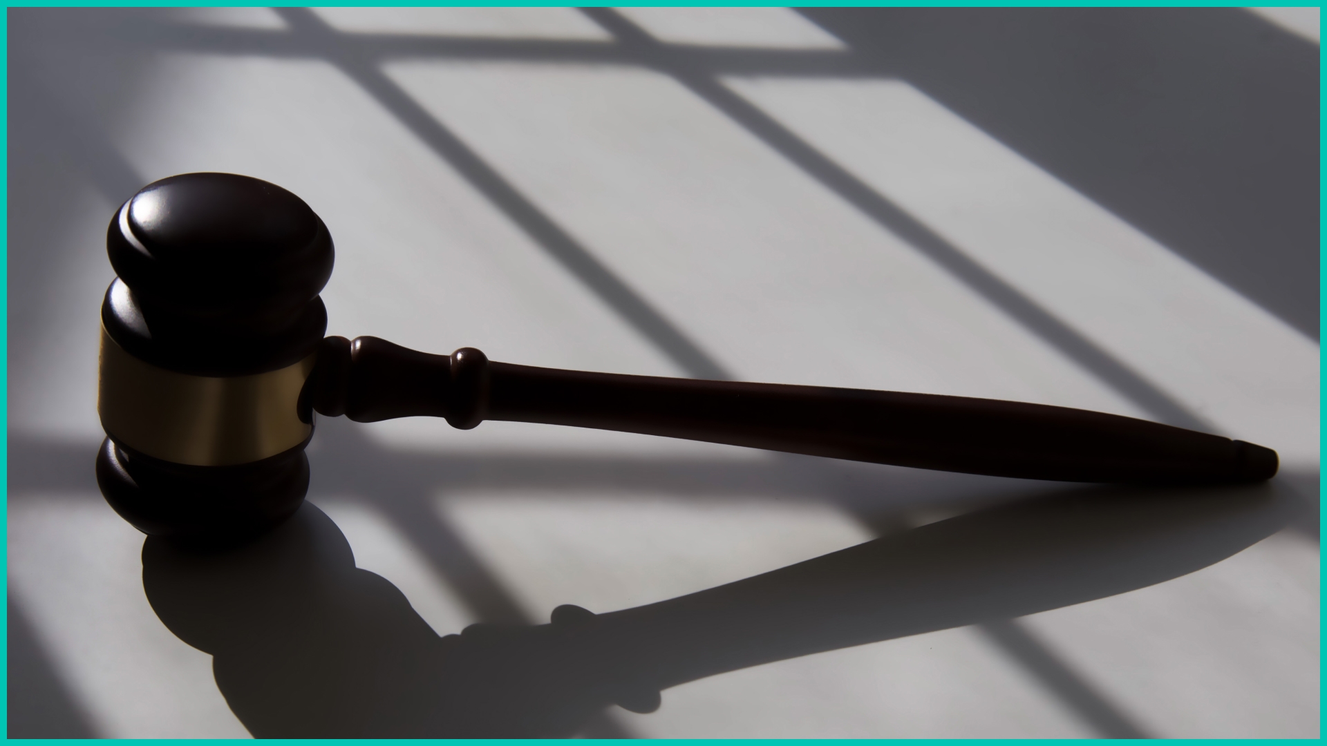 Gavel handcuffs - stock photo