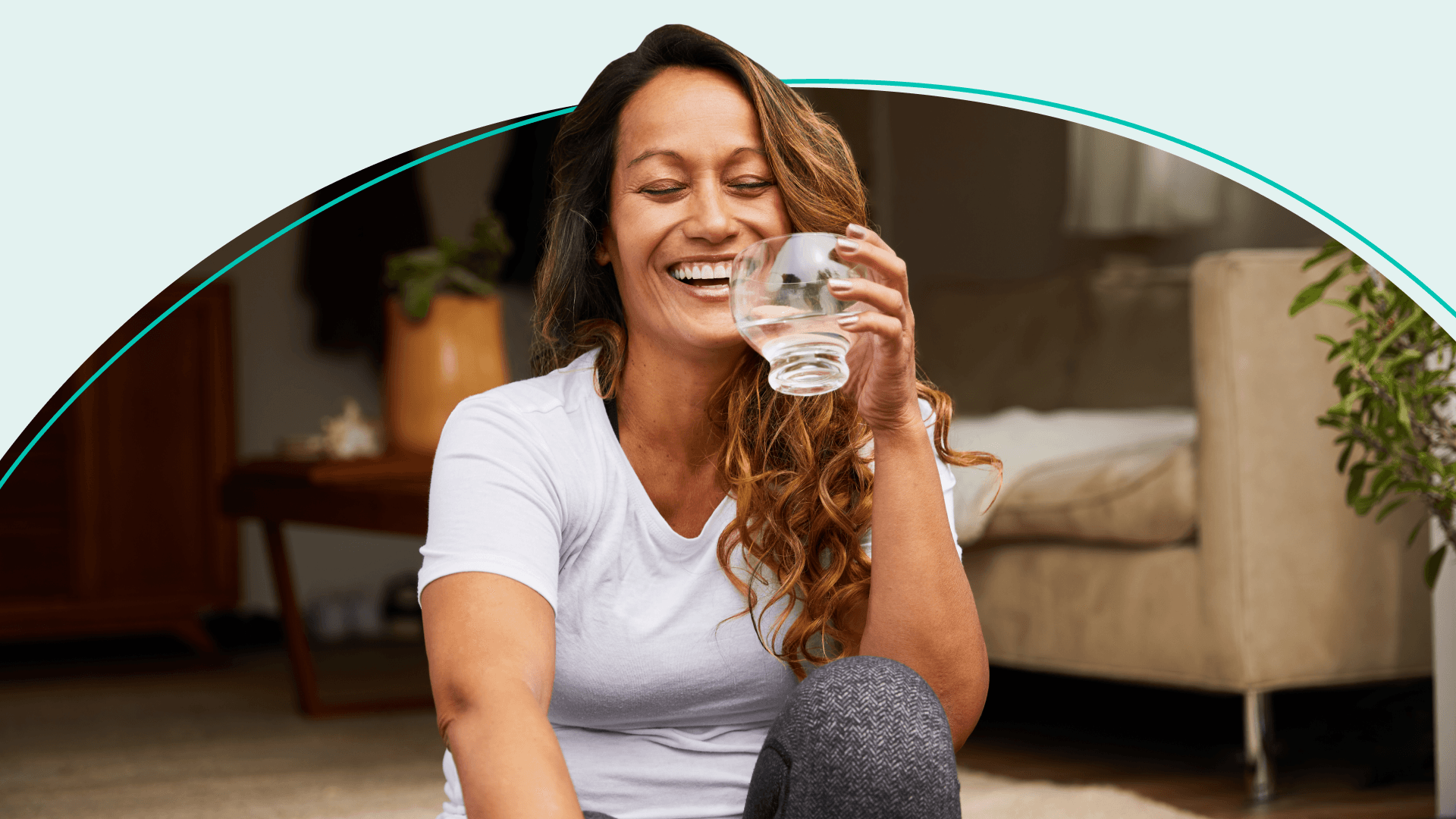 Woman Holding Glass of Water