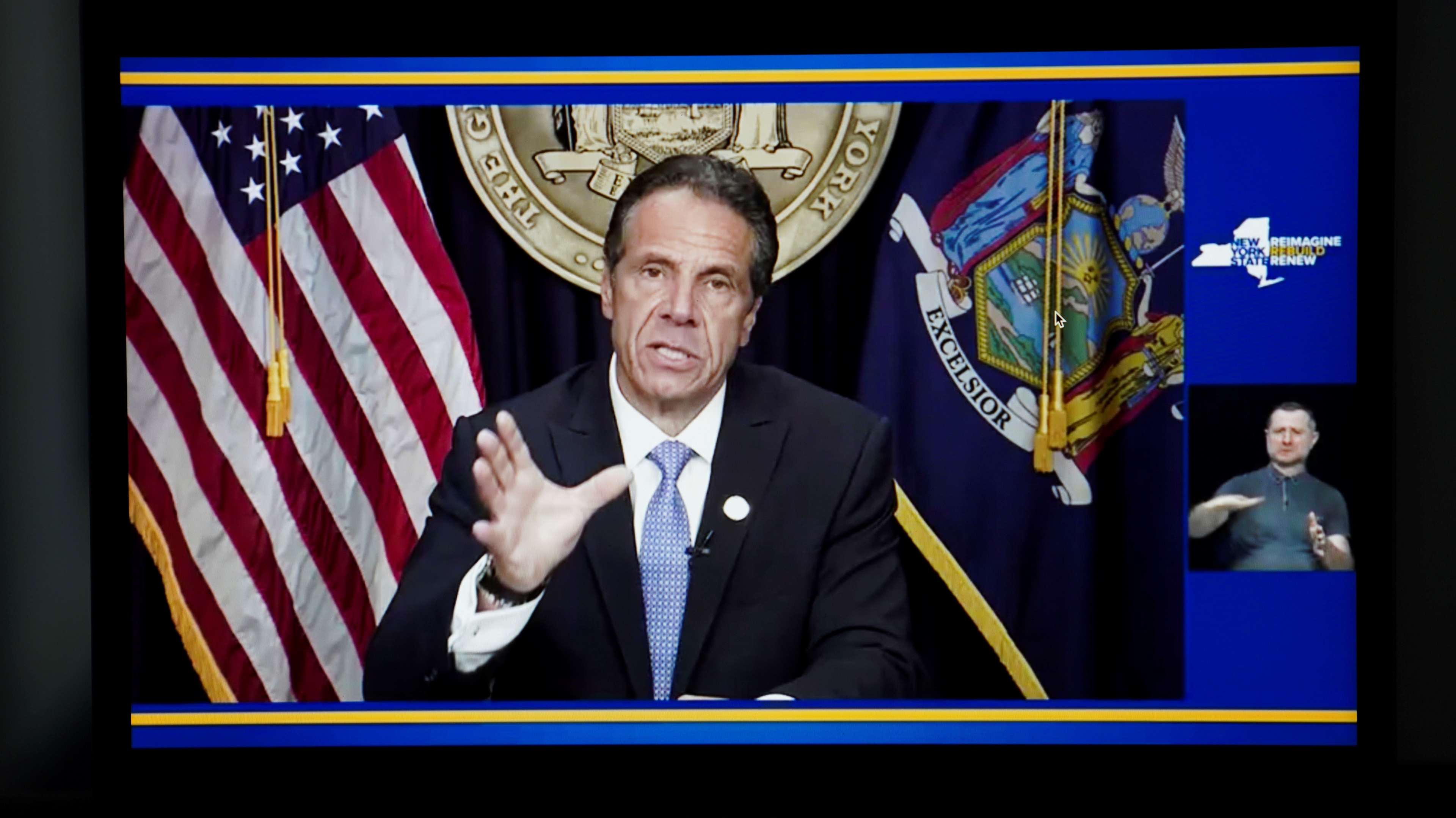 Photo taken from a video in New York, the United States, shows New York Governor Andrew Cuomo speaking during a televised address