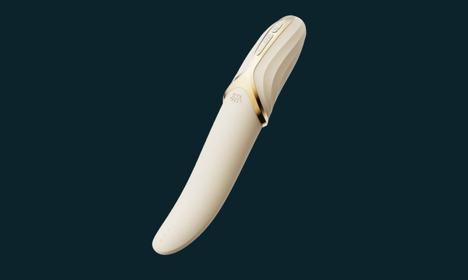 Cream vibrator with gold accents on dark blue background