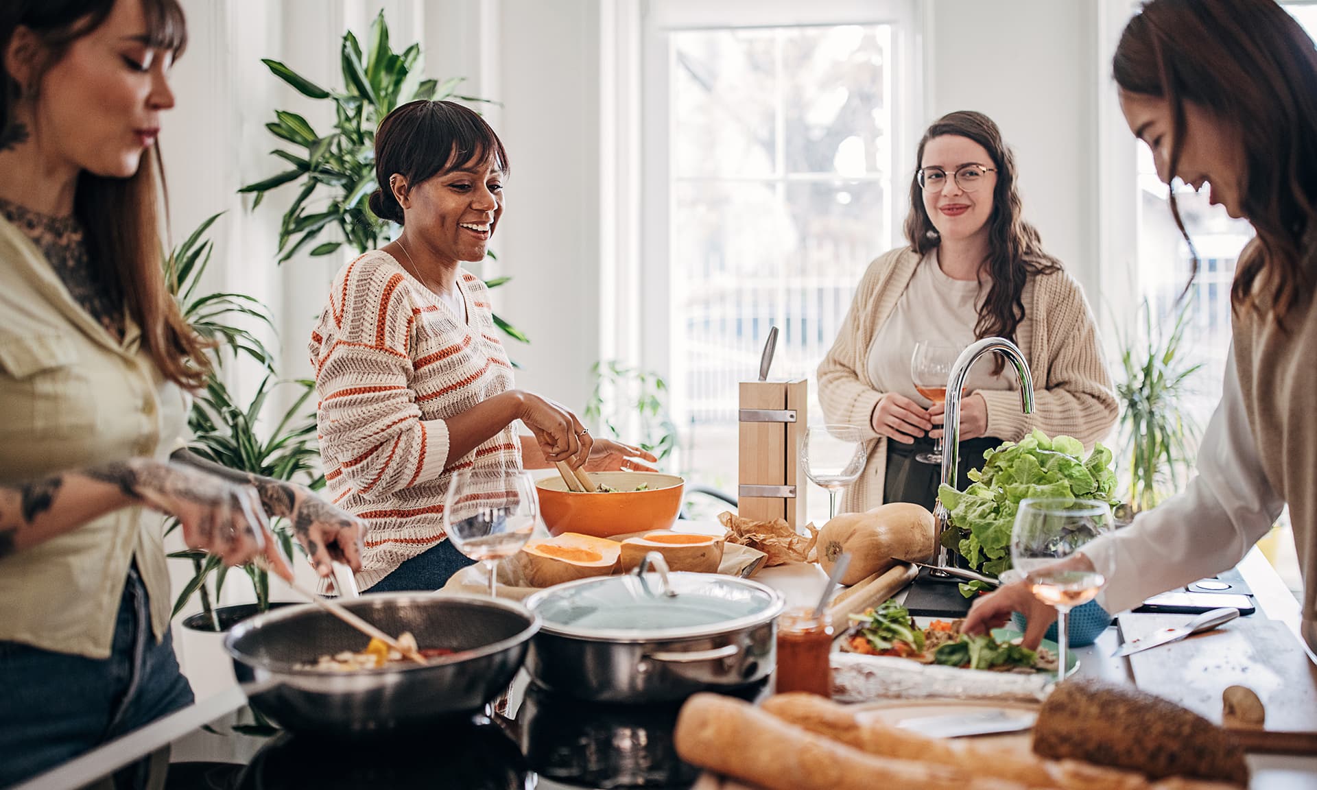 Women cooking together in a kitchen