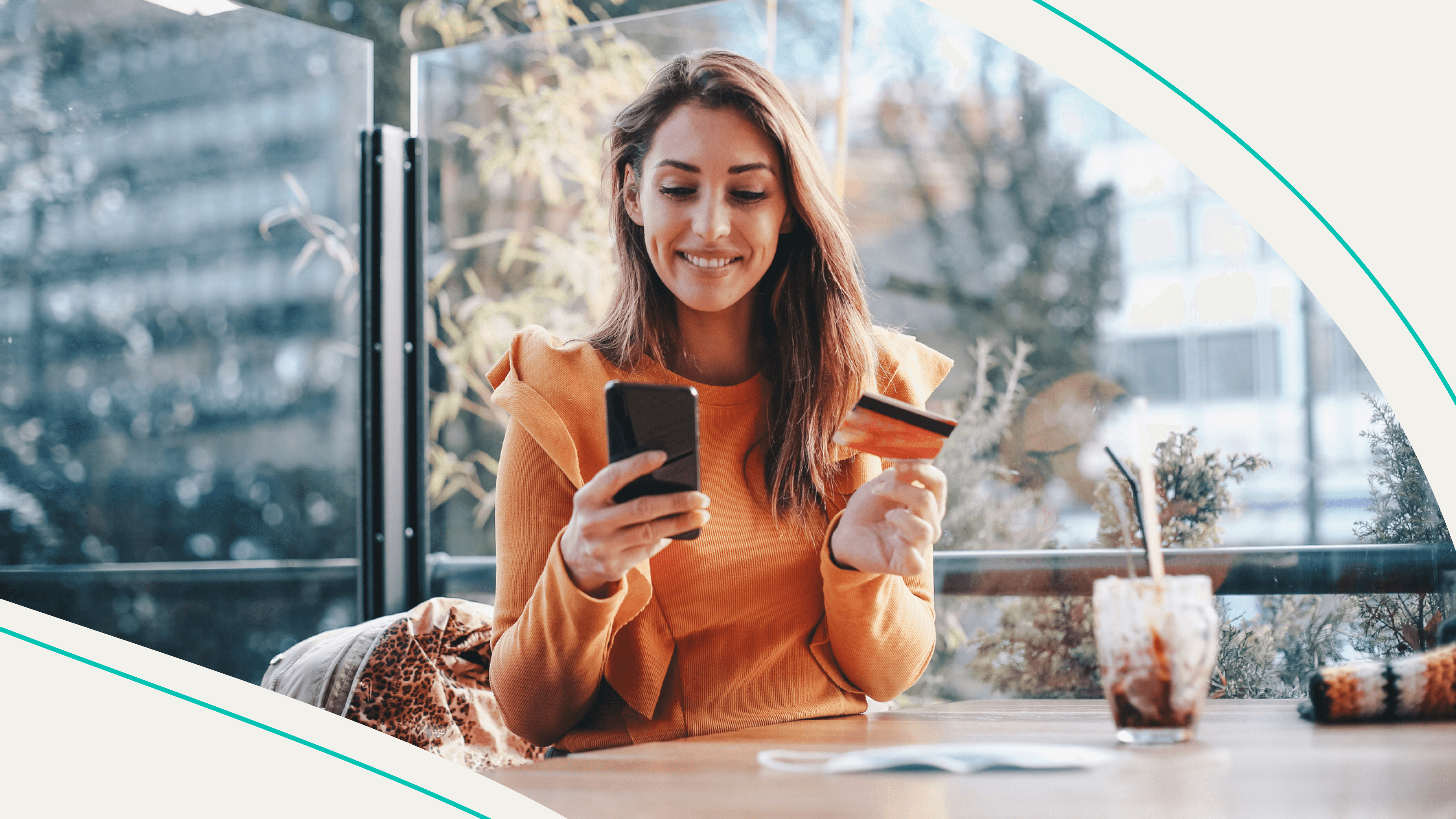 accessibility, smiling woman holding a cell phone and credit card