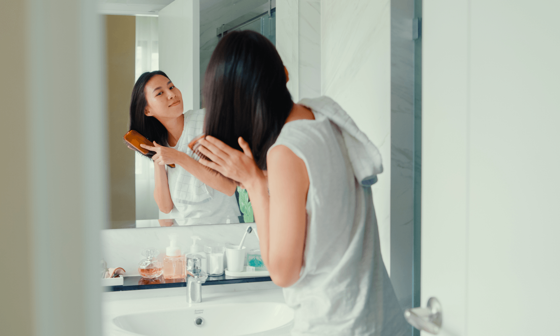 woman brushing hair