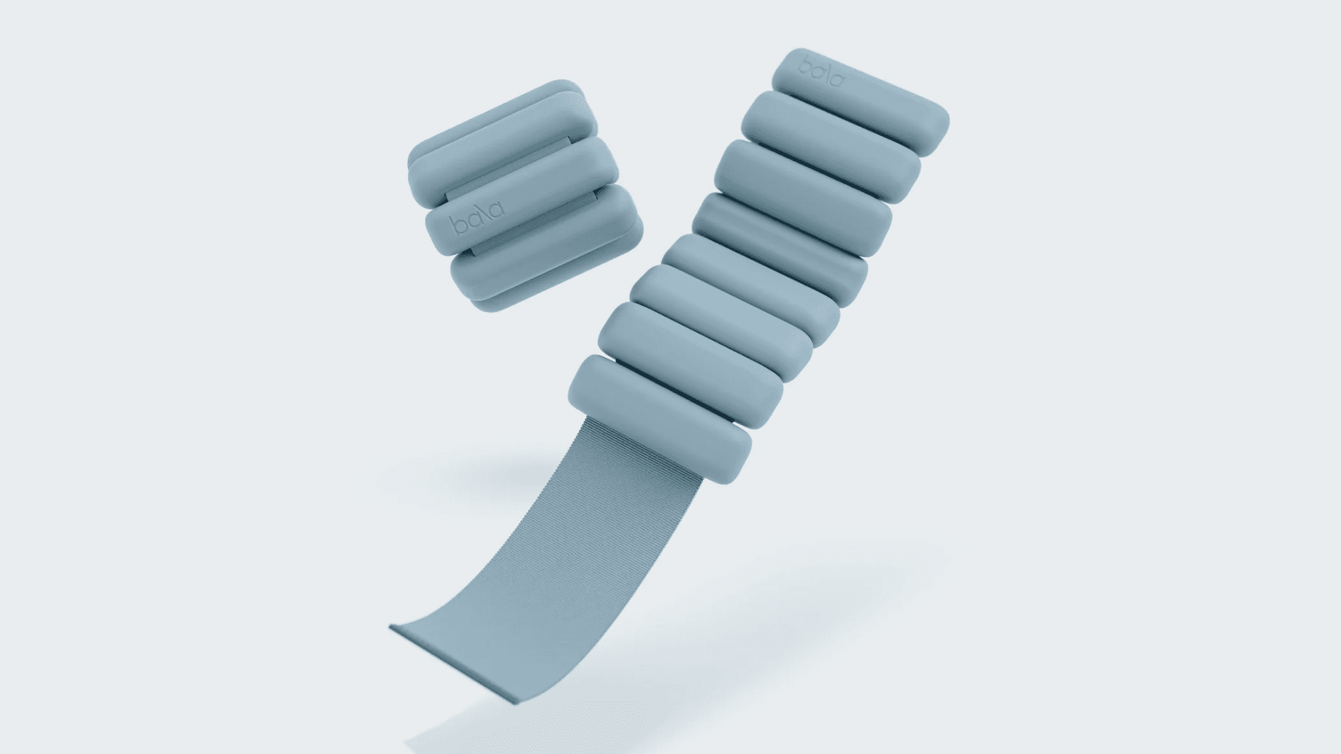 Pale blue wrist weights in closed and open positions