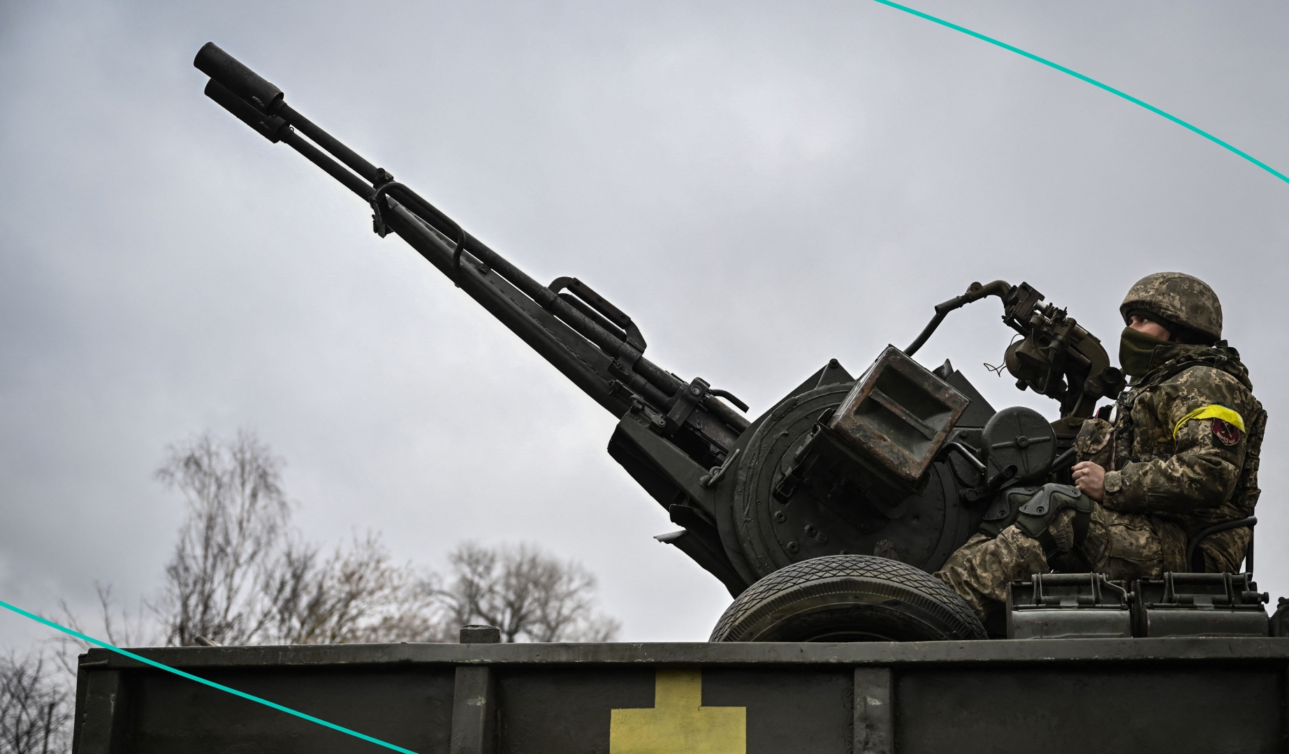 A Ukrainian soldier keeps position at a frontline northeast of Kyiv on March 3, 2022.
