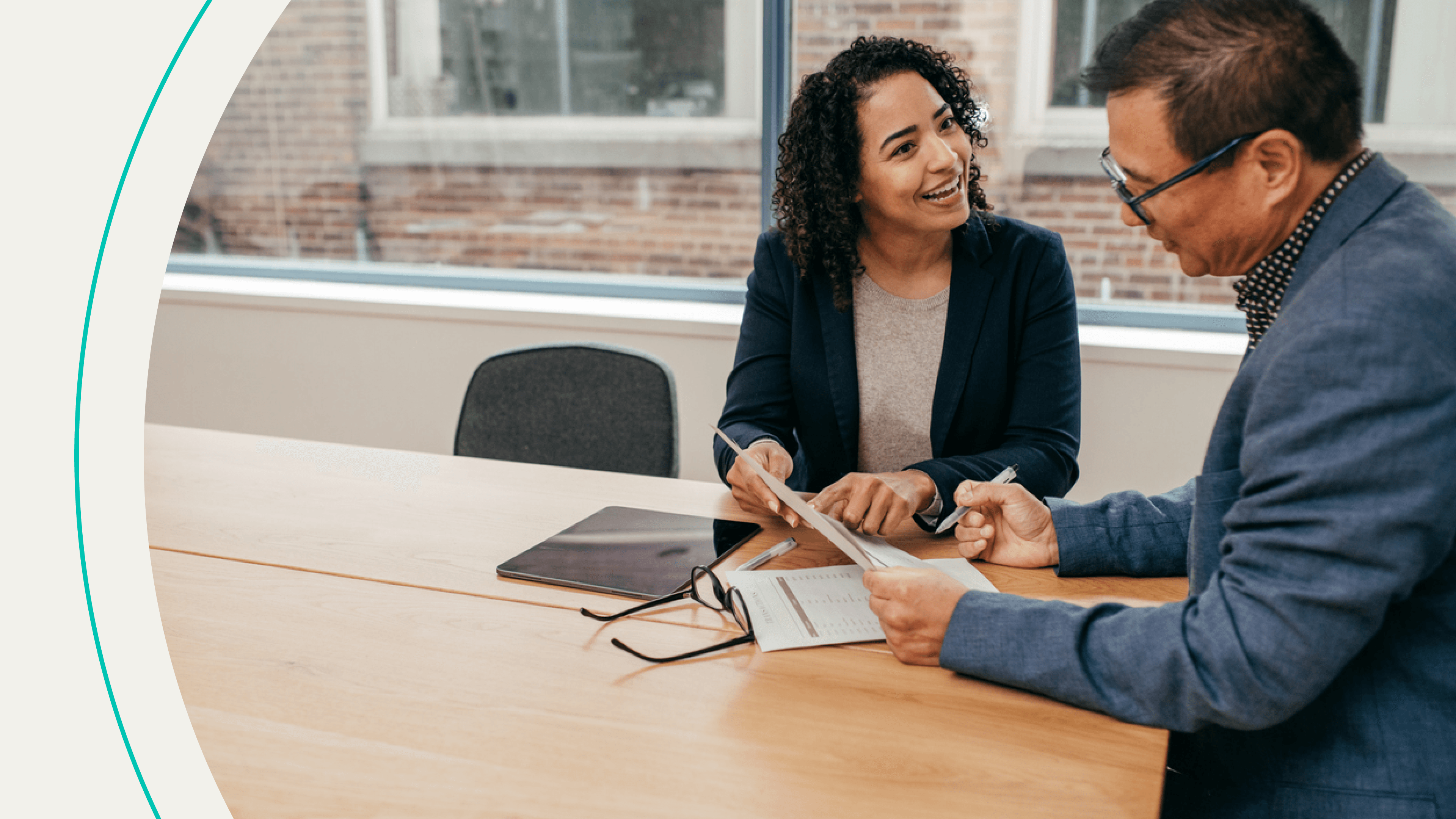 accessibility, woman and man reviewing documents together