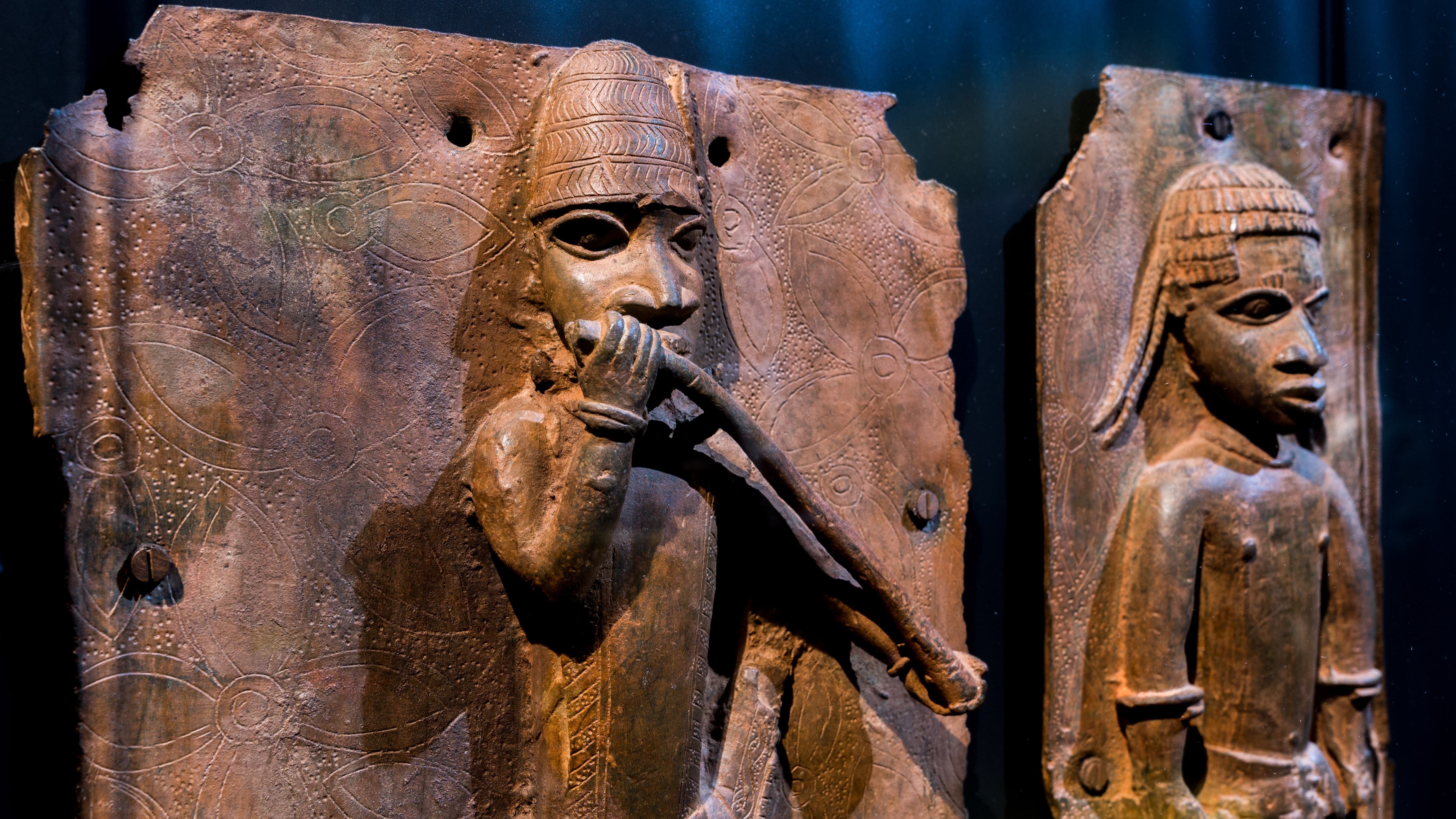 Sculptures looted by British soldiers from the Kingdom of Benin in 1897 hangs on display in the "Where Is Africa" exhibition at the Linden Museum on May 05, 2021 in Stuttgart, Germany.