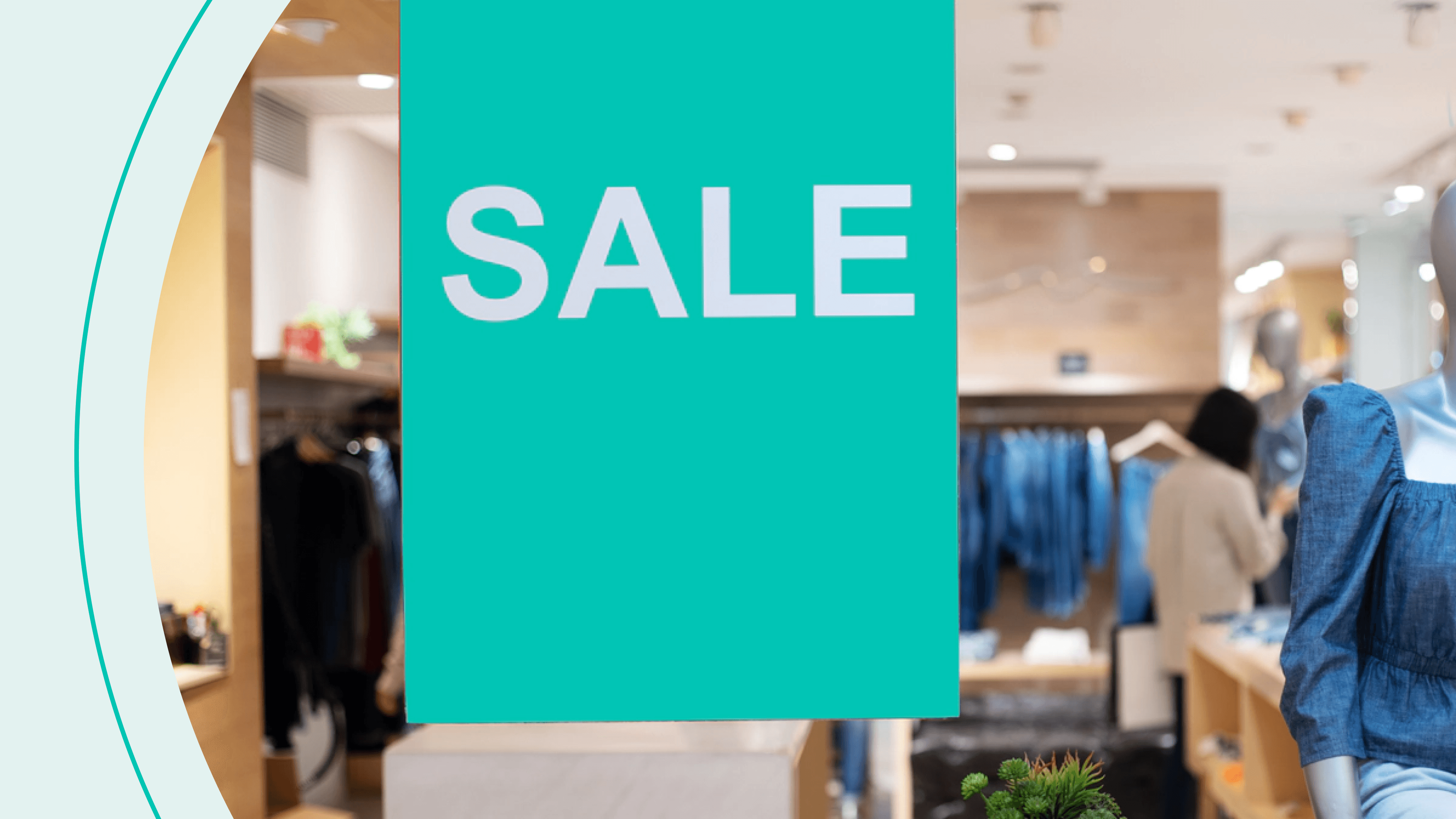 A sale sign in a clothing shop