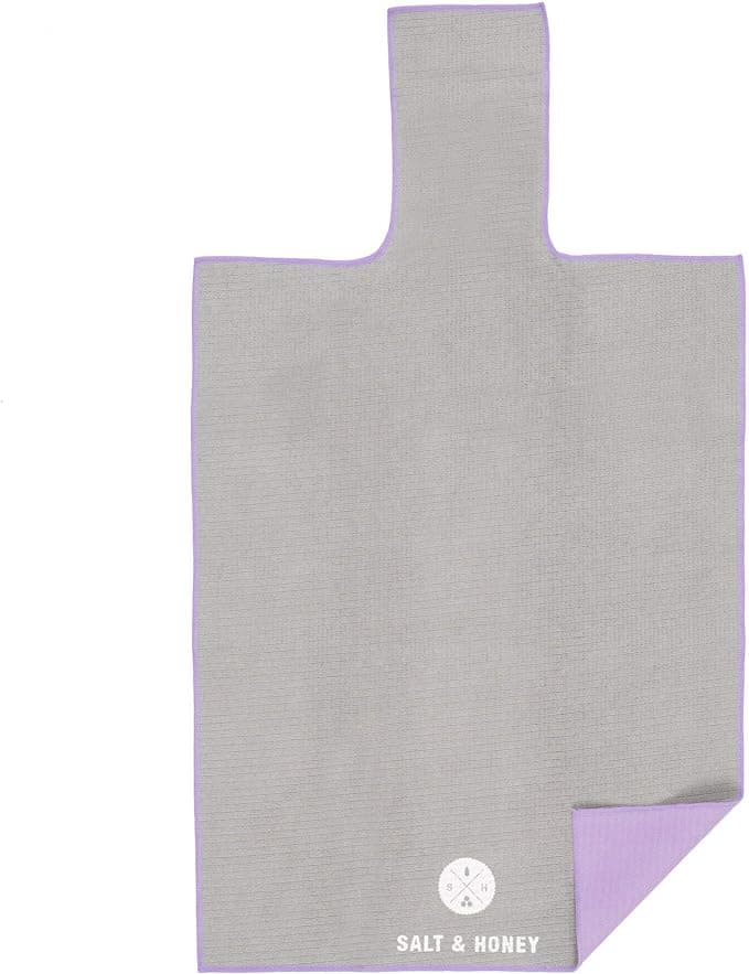 a gray salt and honey non-slip reformer towel for at-home pilates equipment