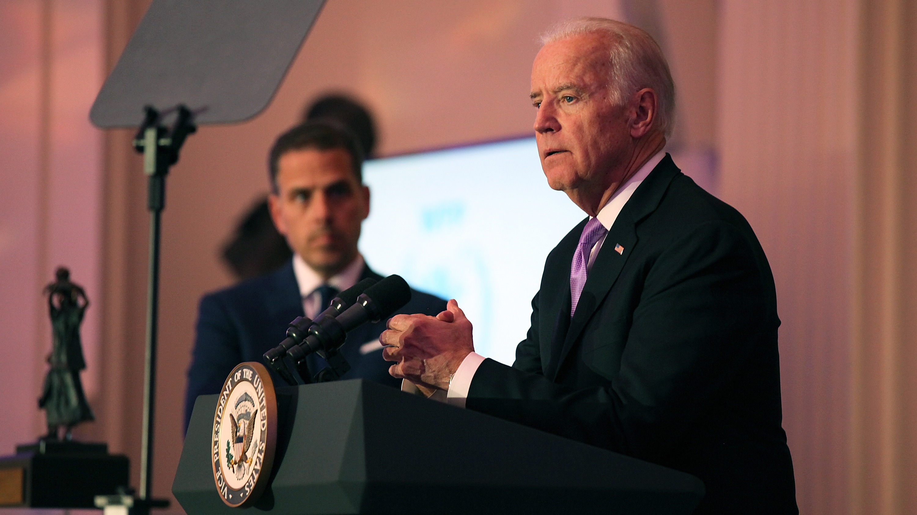 Hunter Biden (L) and U.S. Vice President Joe Biden speak on stage at the World Food Program USA's Annual McGovern-Dole Leadership Award Ceremony at Organization of American States on April 12, 2016 in Washington, DC.