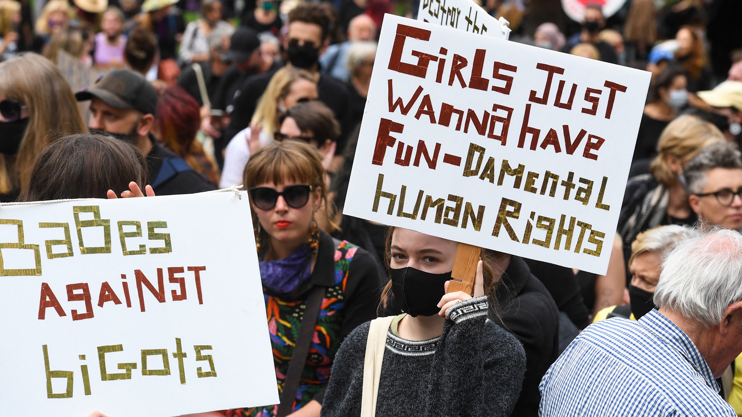 People attend a protest against sexual violence and gender inequality