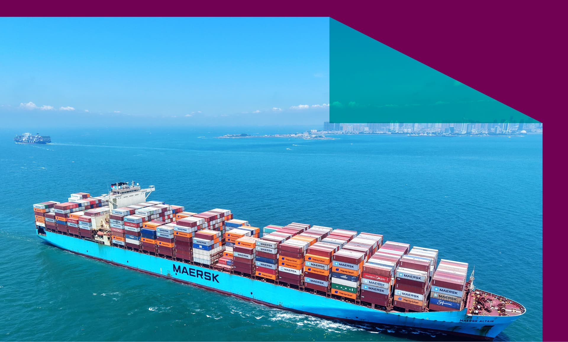 A cargo ship sails on the Jiaozhou Bay Channel while loading foreign trade containers in Qingdao Port, Qingdao City, Shandong Province, China, on July 26, 2025.