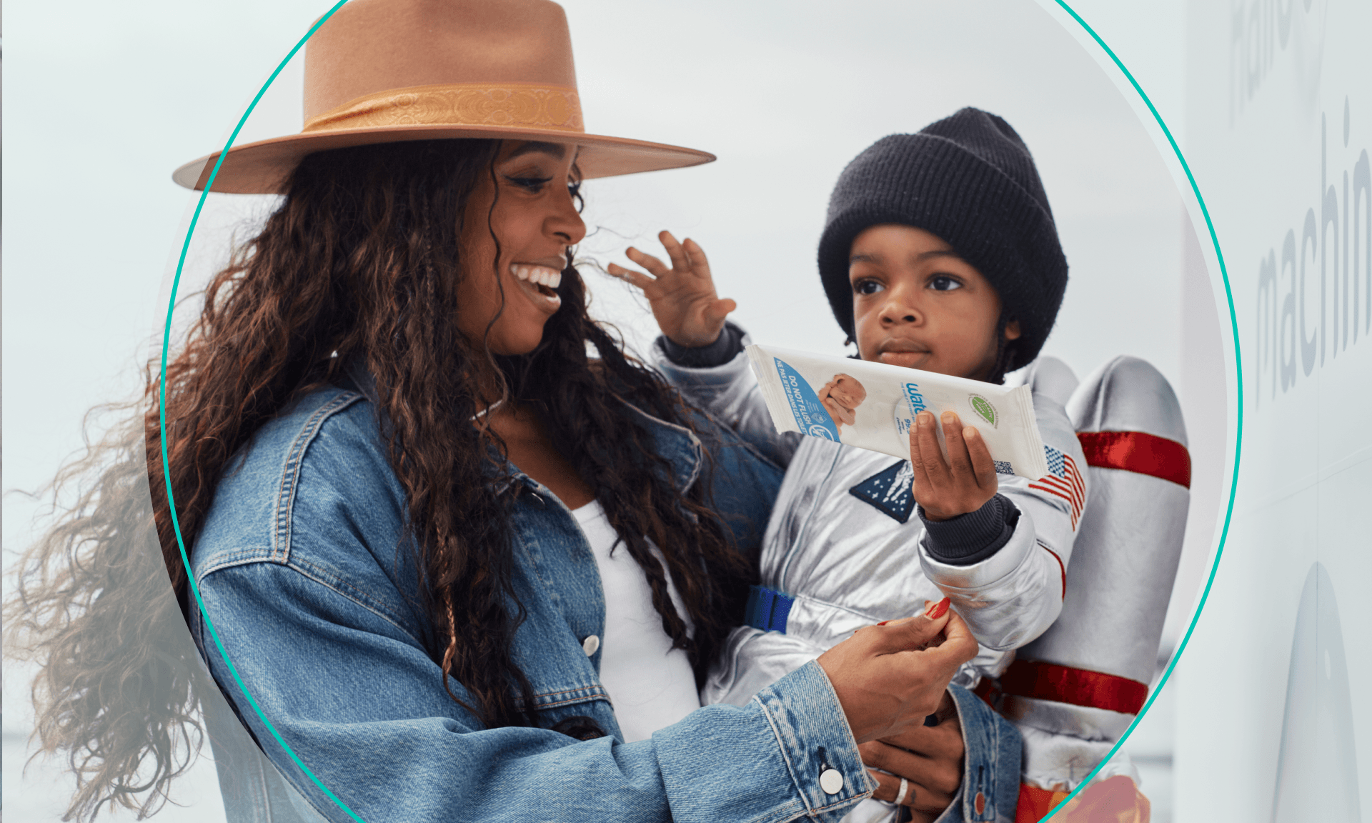 Kelly Rowland and her son with WaterWipes