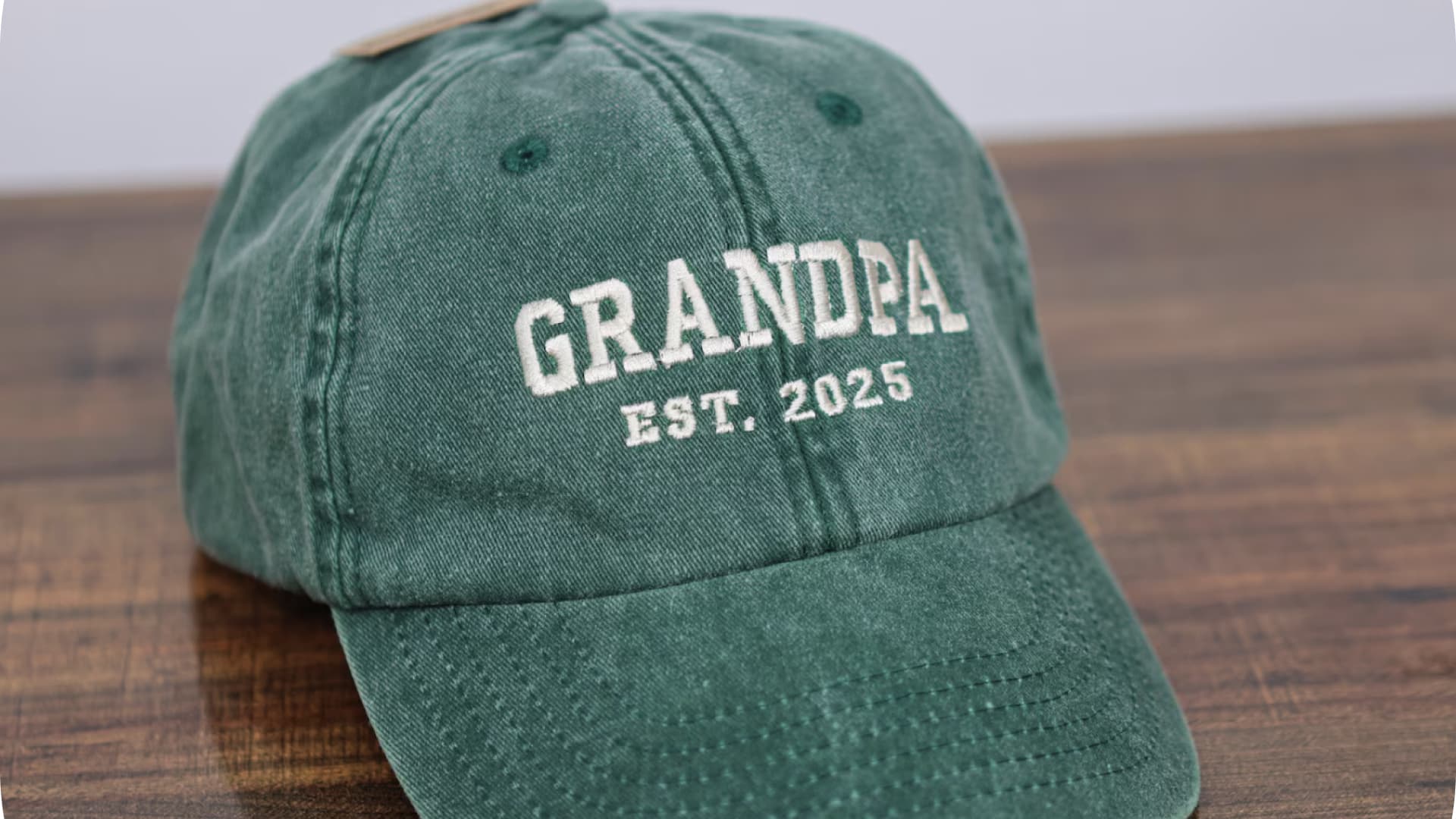 A hat that you can embroider to say Grandpa and the established date.