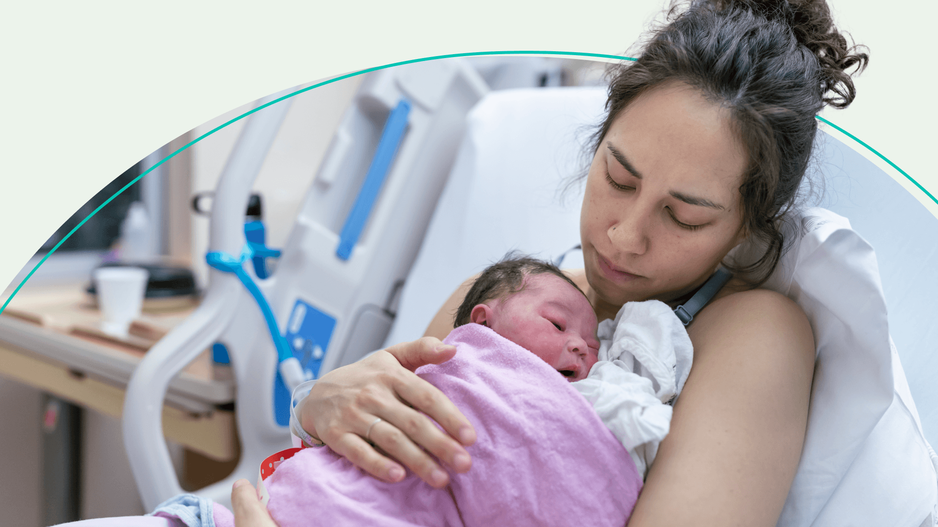 parent holding newborn