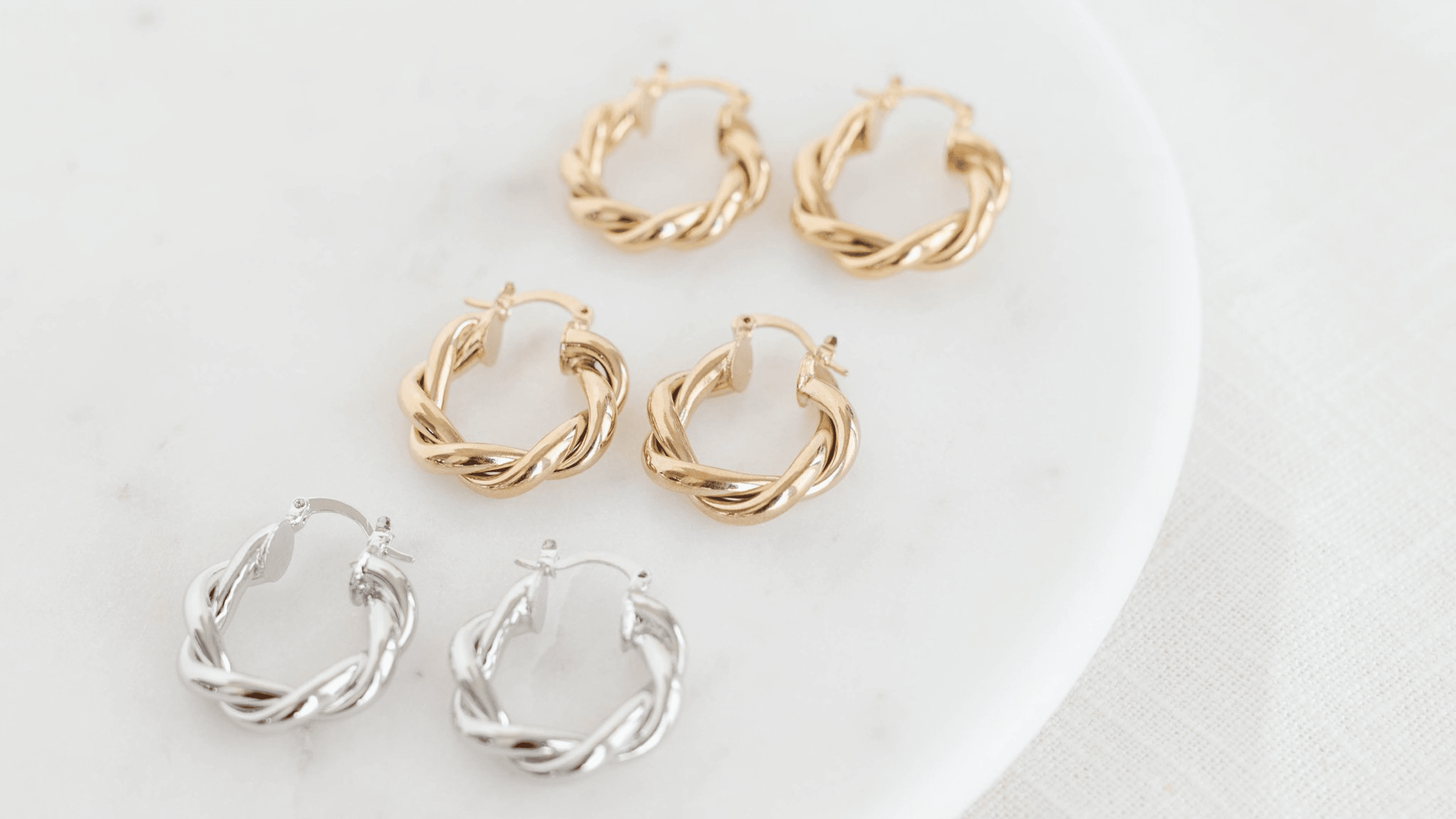 gold twisted hoop earrings