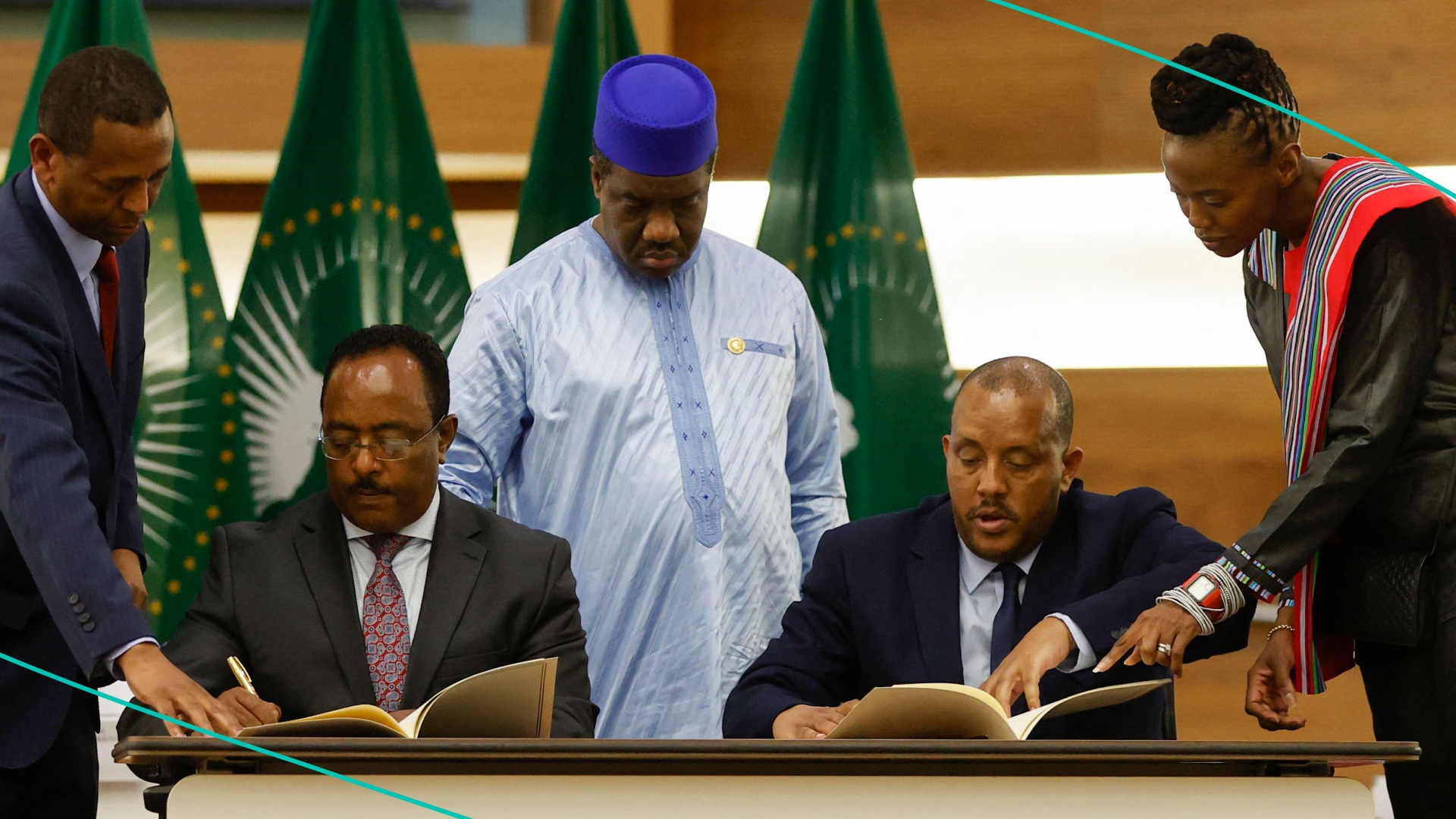 Representative of the Ethiopian government, and Getachew Reda (2nd R), Representative of the Tigray People's Liberation Front (TPLF), sign a peace agreement.