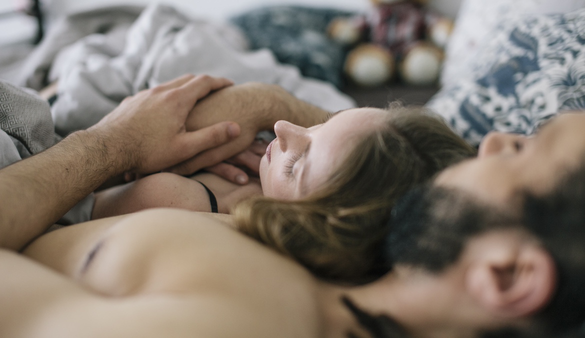 Featured image for Why Do You Sleep Better Next to Your Partner? Sleep Psychologists Weigh In