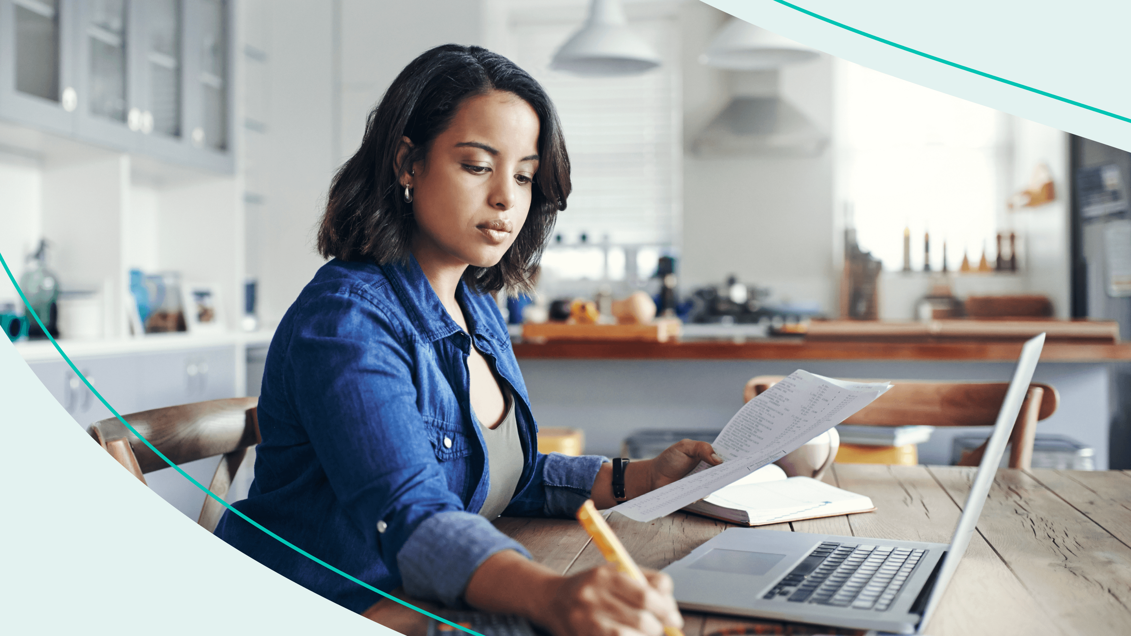 Woman looks concerned in front of a laptop