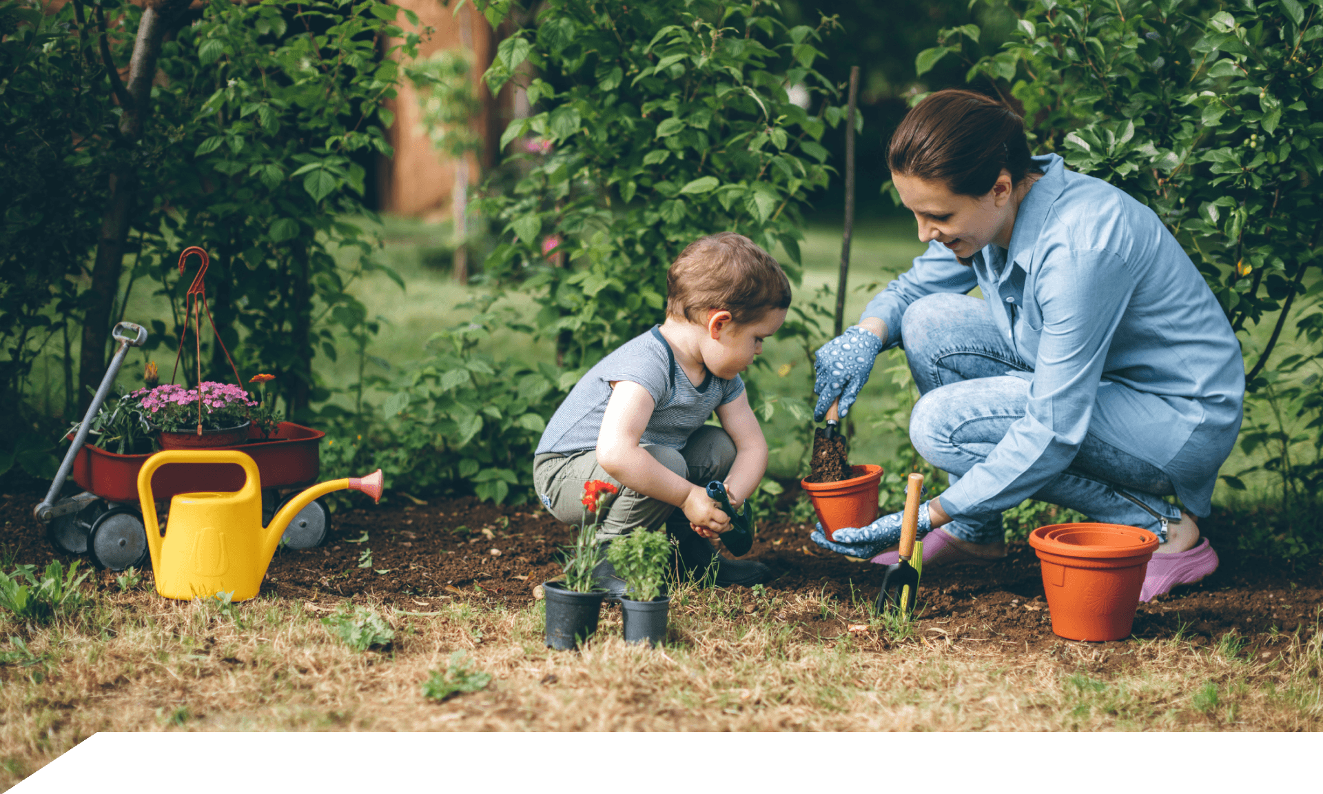 A woman and her son gardening